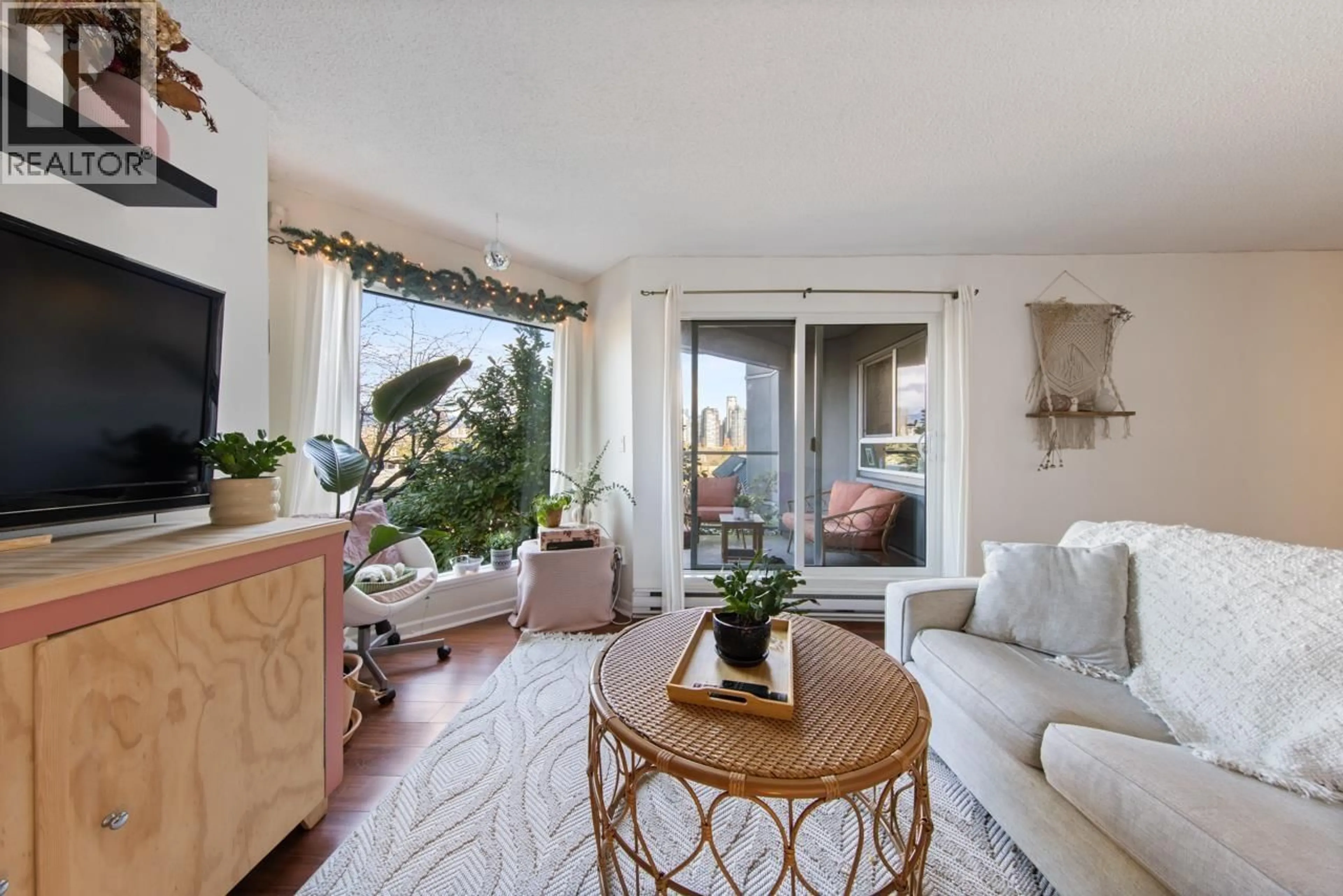 Living room with furniture, unknown for 205 - 1345 4TH AVENUE, Vancouver British Columbia V6H3Y8