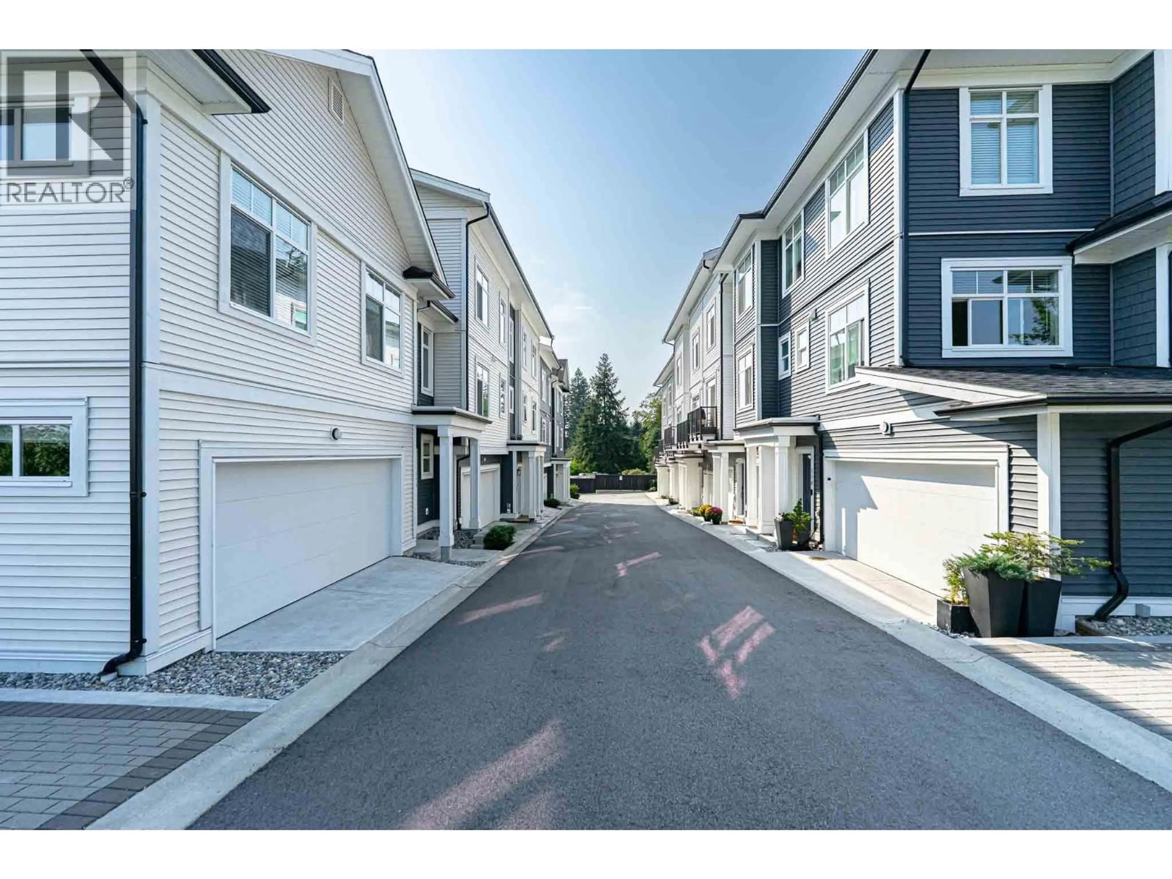 A pic from outside/outdoor area/front of a property/back of a property/a pic from drone, street for 112 - 3489 BAYCREST AVENUE, Coquitlam British Columbia V3B0T4
