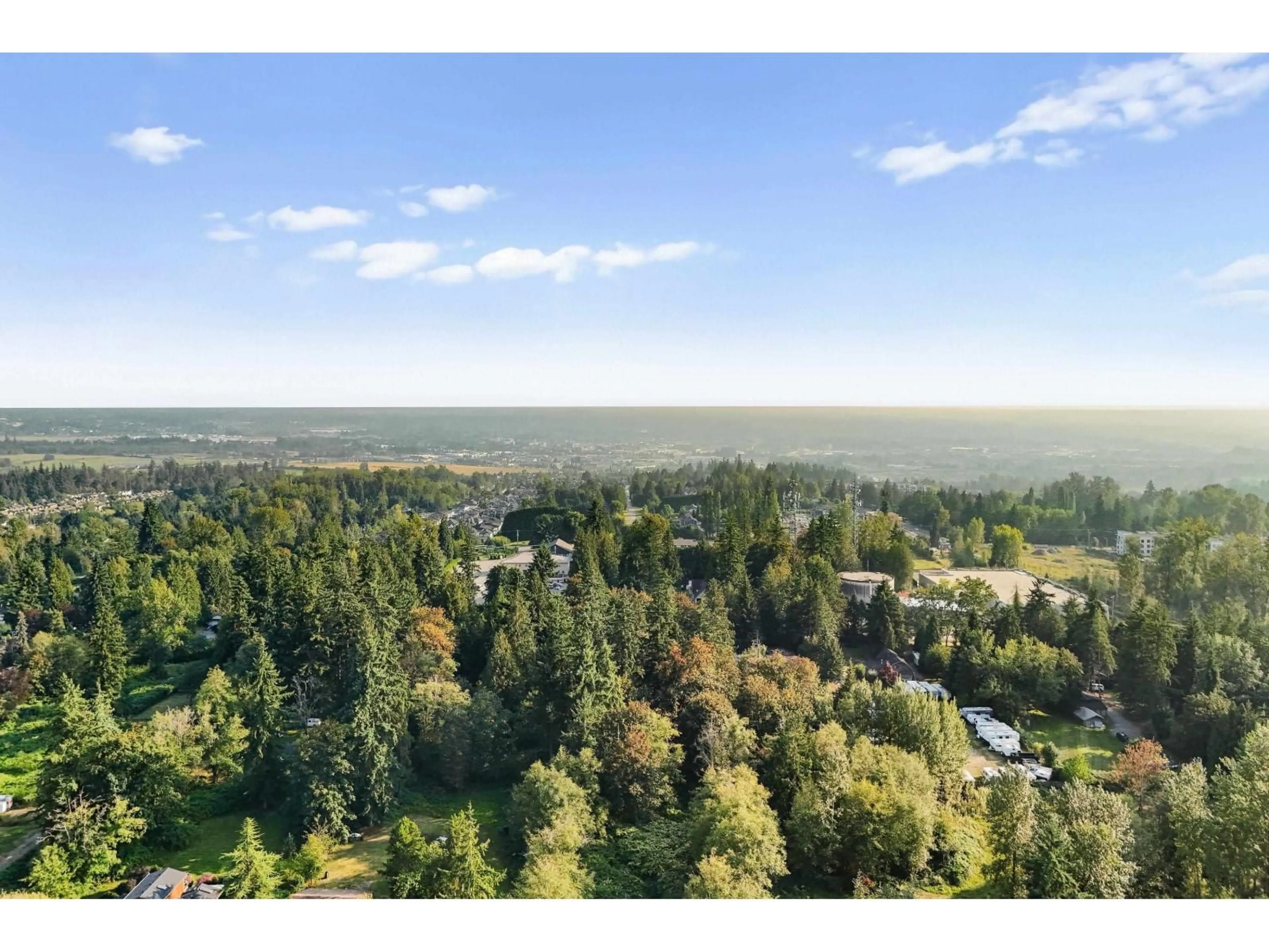 A pic from outside/outdoor area/front of a property/back of a property/a pic from drone, forest/trees view for 20516 75, Langley British Columbia V2Y1V5