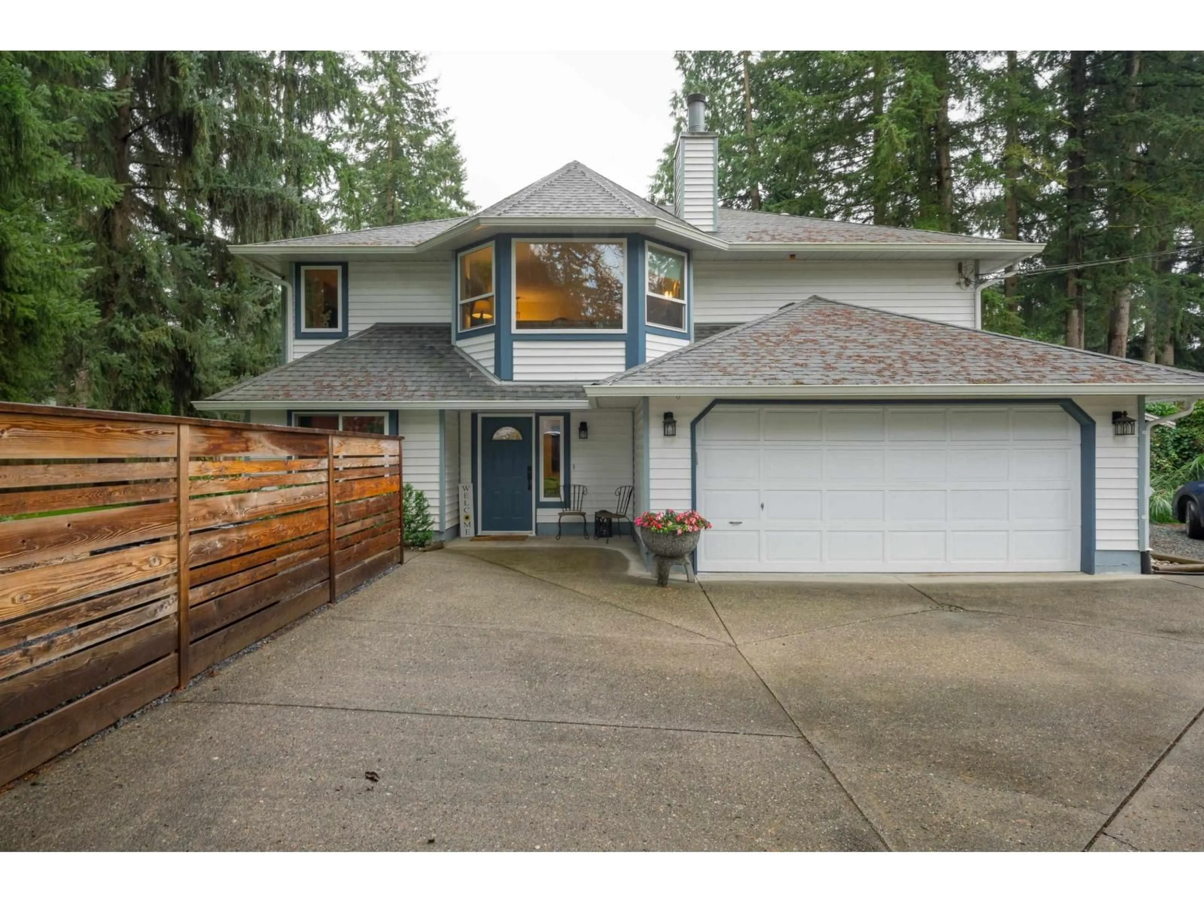 Home with vinyl exterior material, street for 3862 204, Langley British Columbia V3A1X4