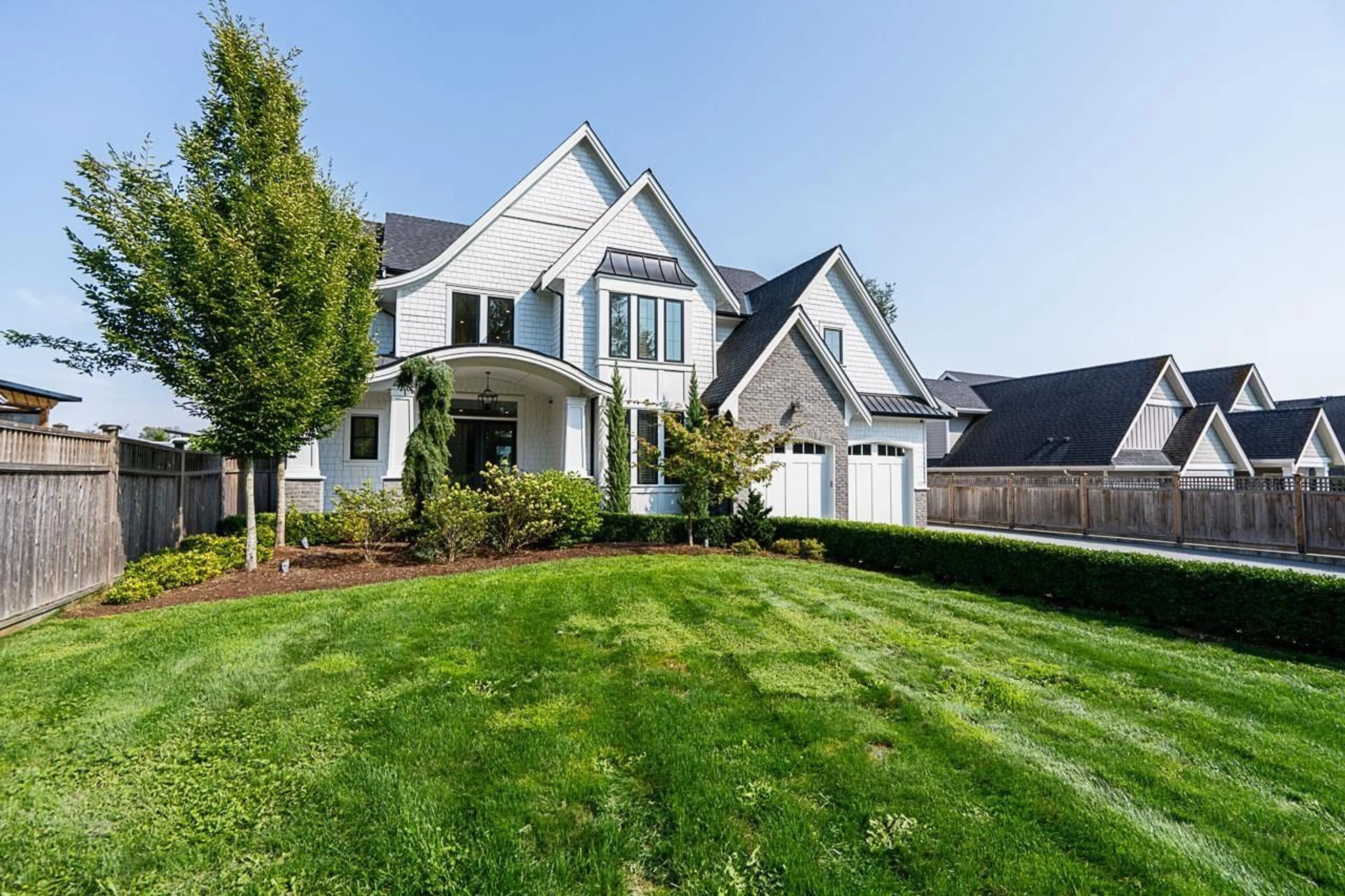 Home with vinyl exterior material, street for 1130 216, Langley British Columbia V2Z1R3