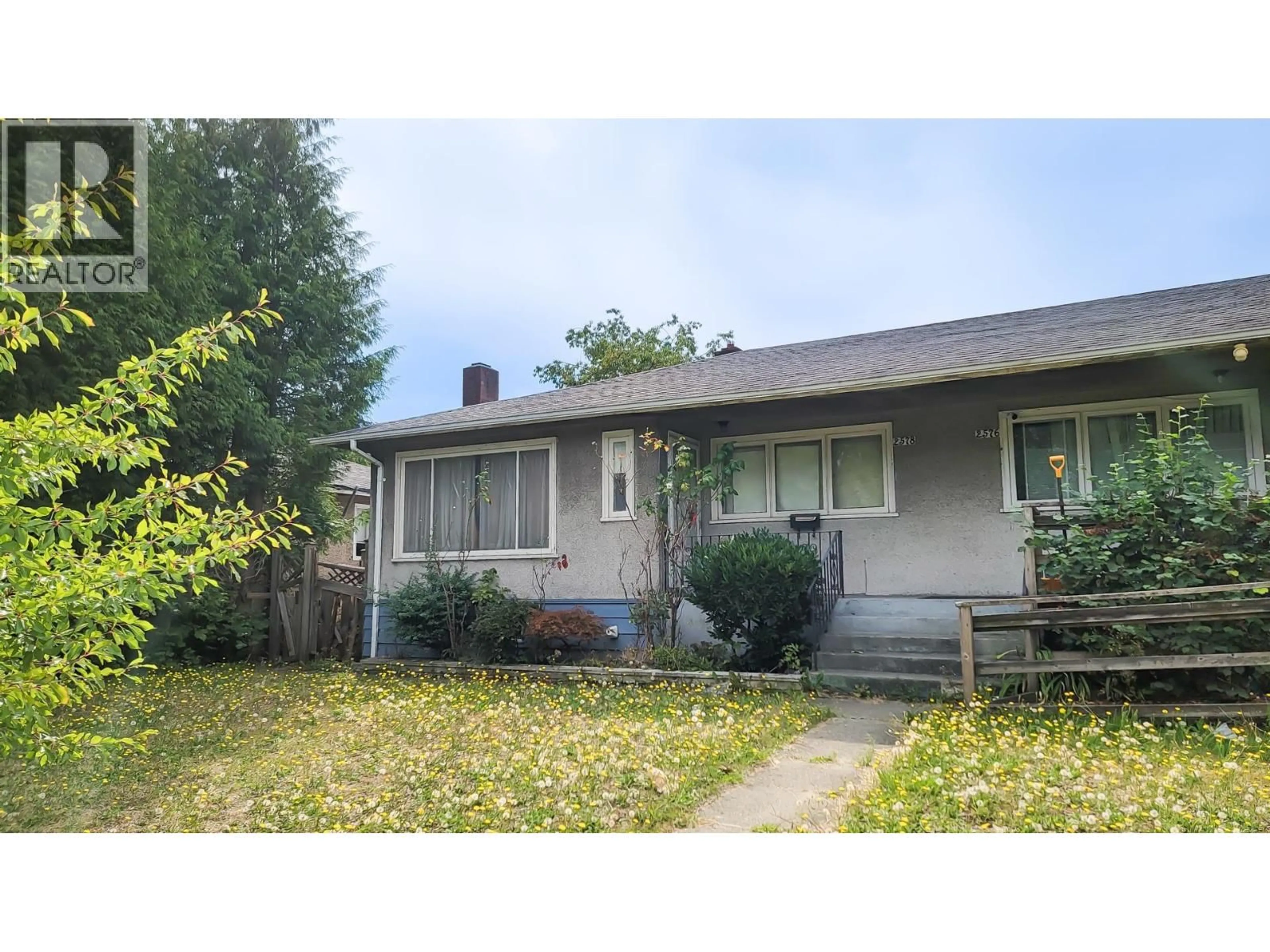Home with vinyl exterior material, street for 2578 GRANDVIEW HIGHWAY, Vancouver British Columbia V5M2C8