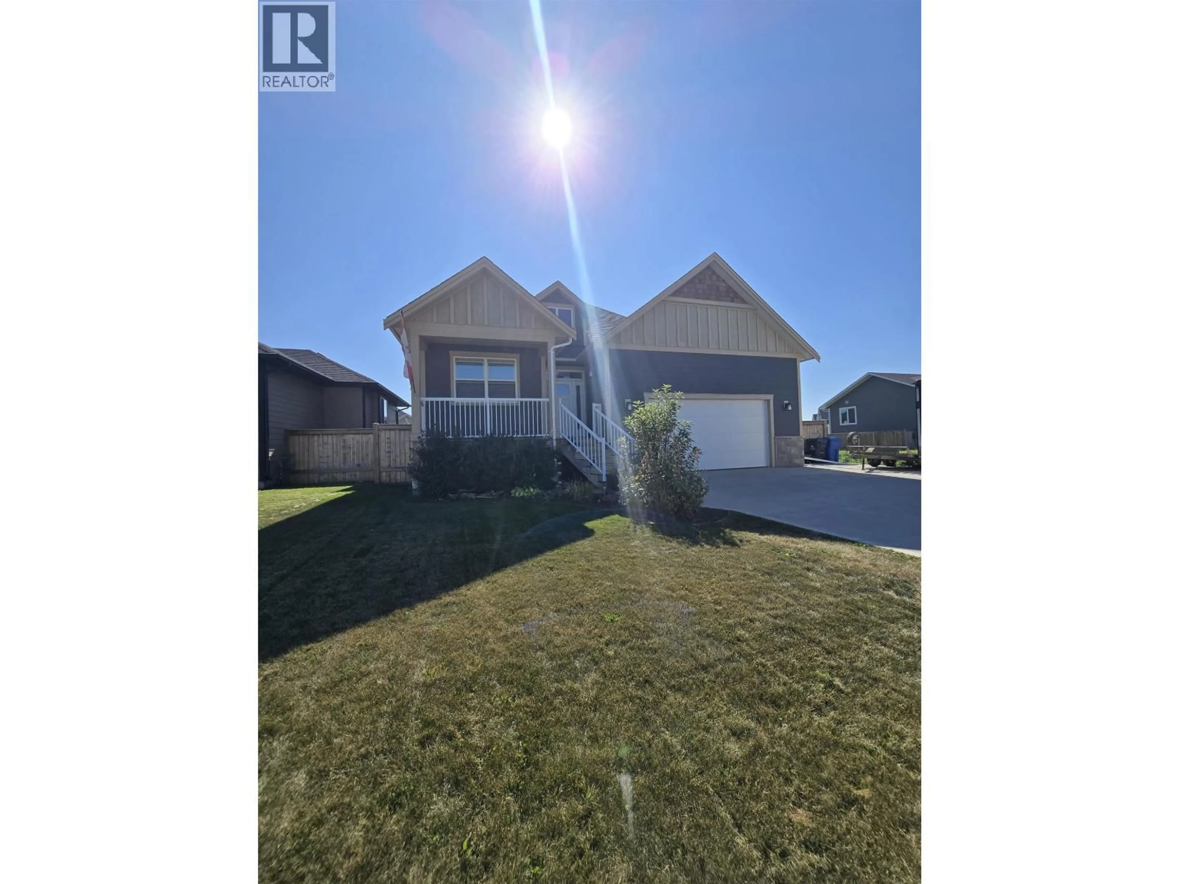 A pic from outside/outdoor area/front of a property/back of a property/a pic from drone, water/lake/river/ocean view for 11203 115 AVENUE, Fort St. John British Columbia V1J0N4