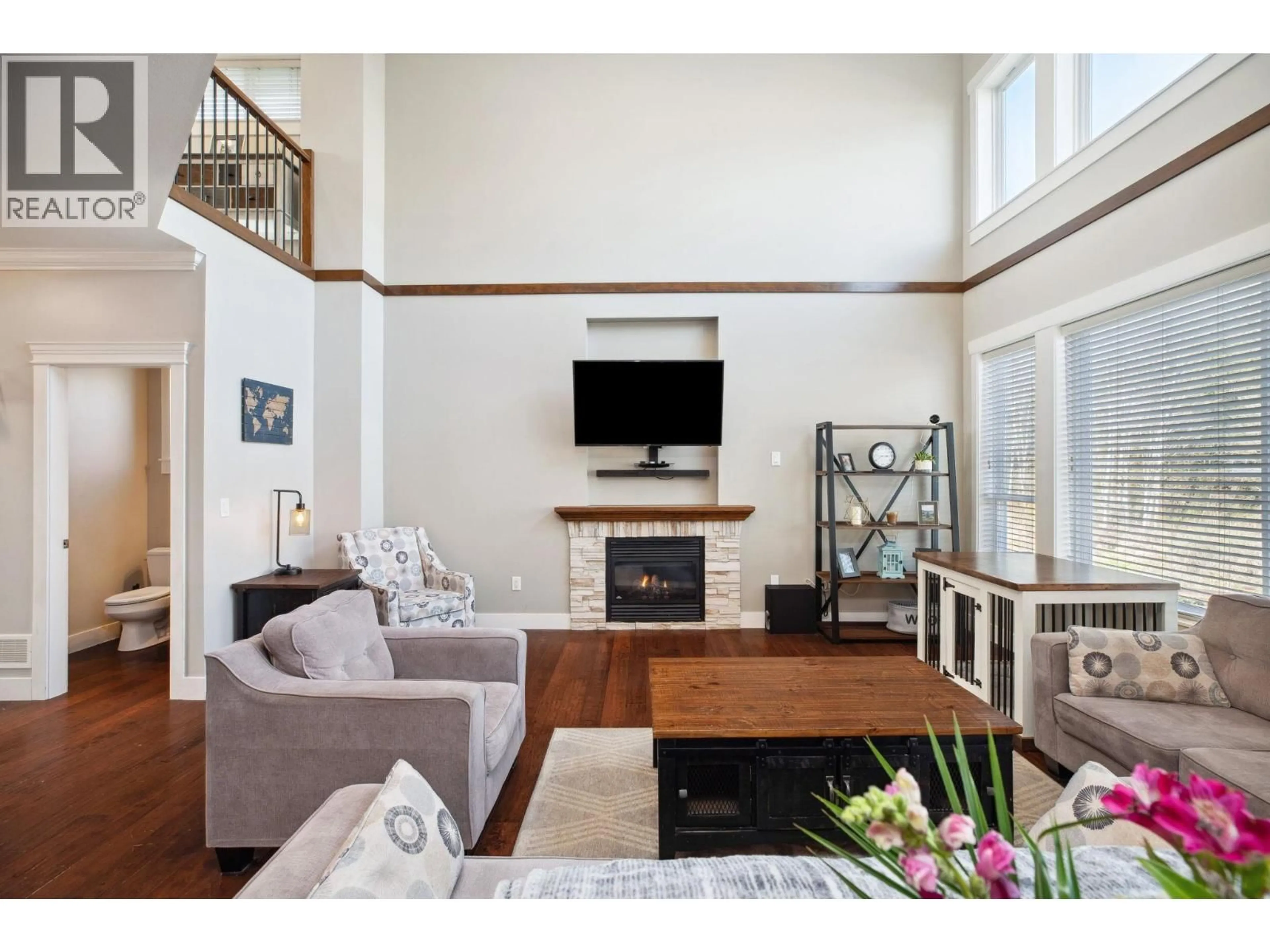Living room with furniture, wood/laminate floor for 23325 GRIFFEN ROAD, Maple Ridge British Columbia V2W0B6