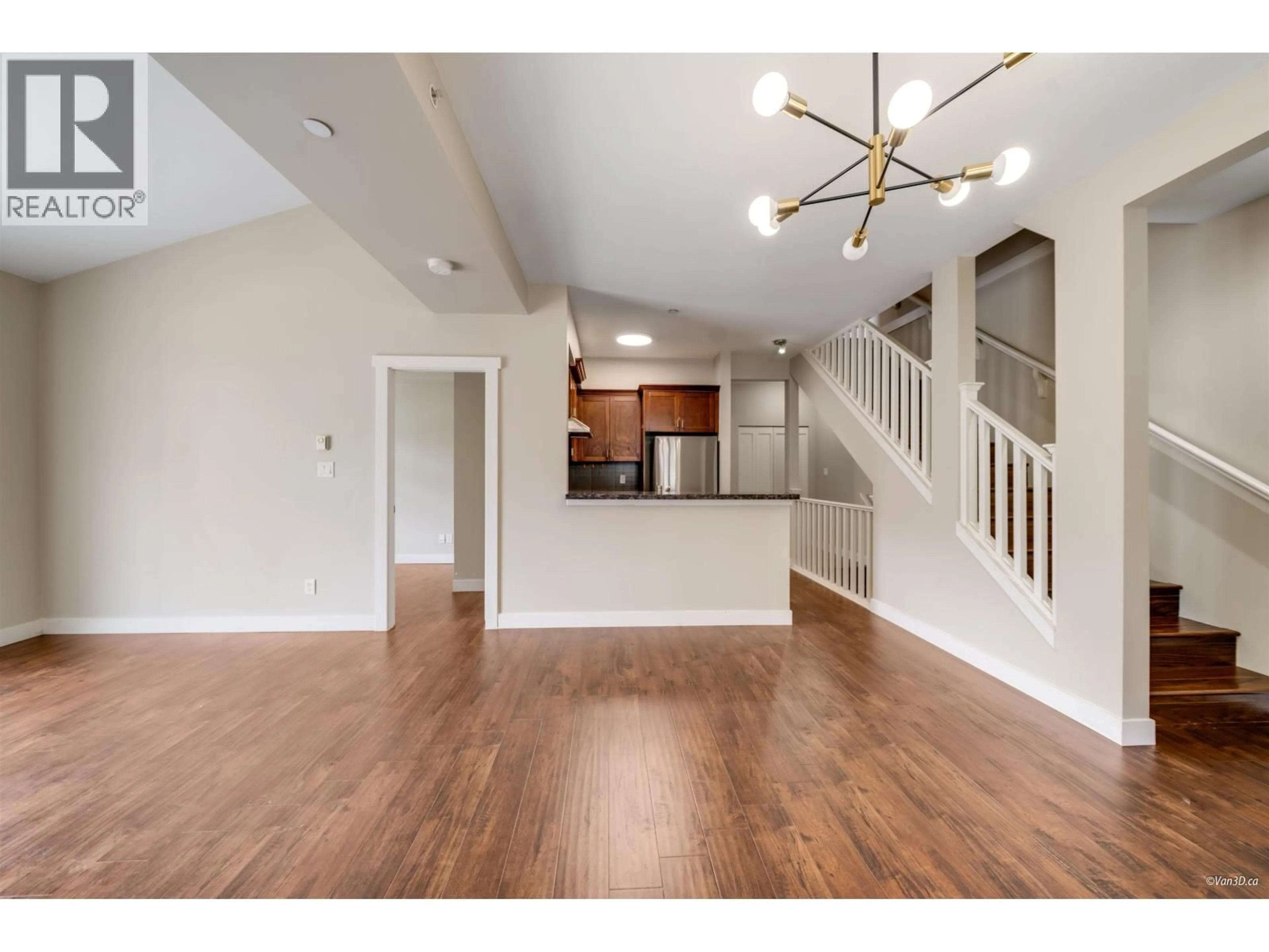 Open concept kitchen, wood/laminate floor for 18 - 7388 MACPHERSON AVENUE, Burnaby British Columbia V5J0A1