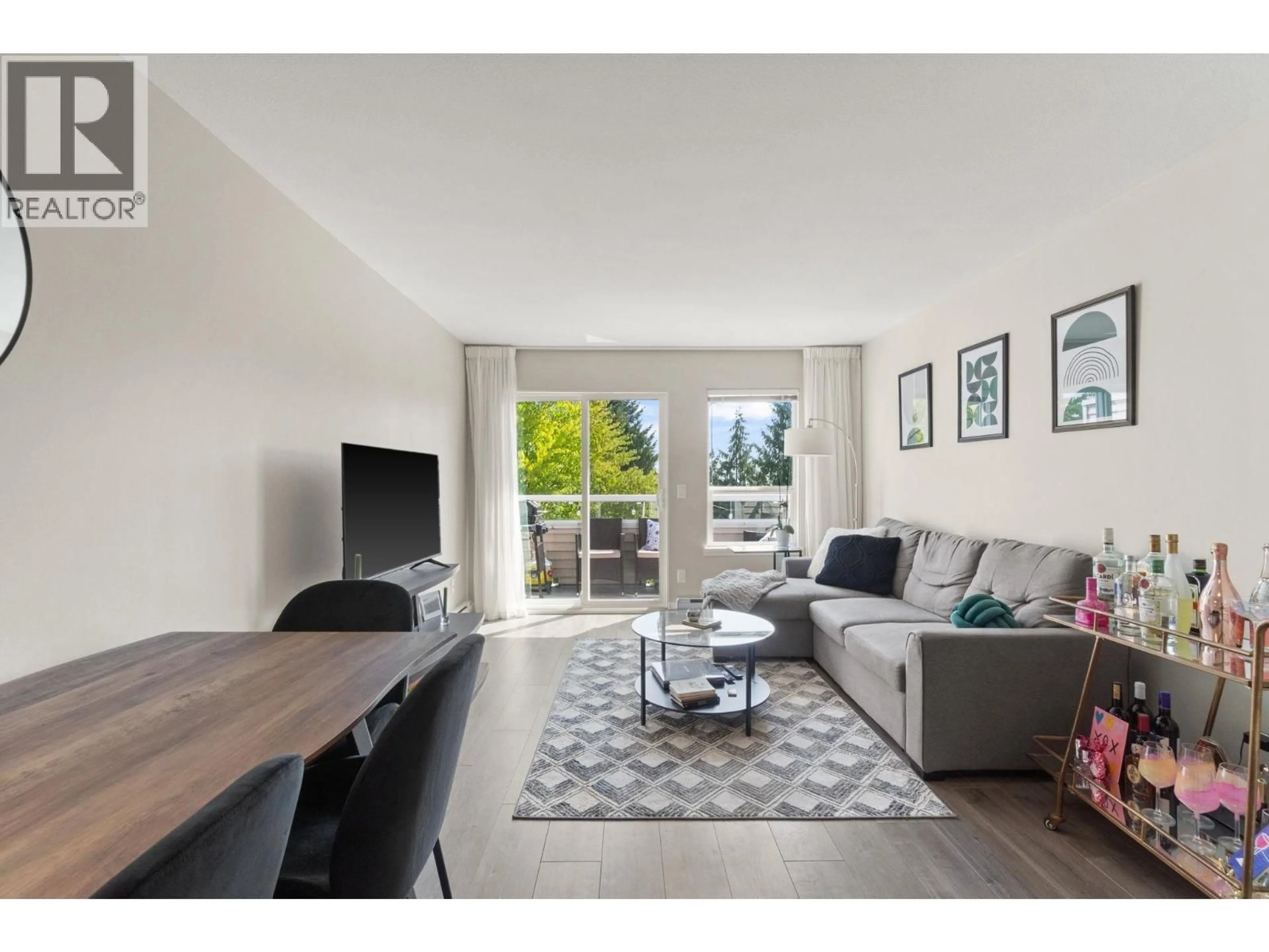 Living room with furniture, unknown for 402 - 450 BROMLEY STREET, Coquitlam British Columbia V3K6S5
