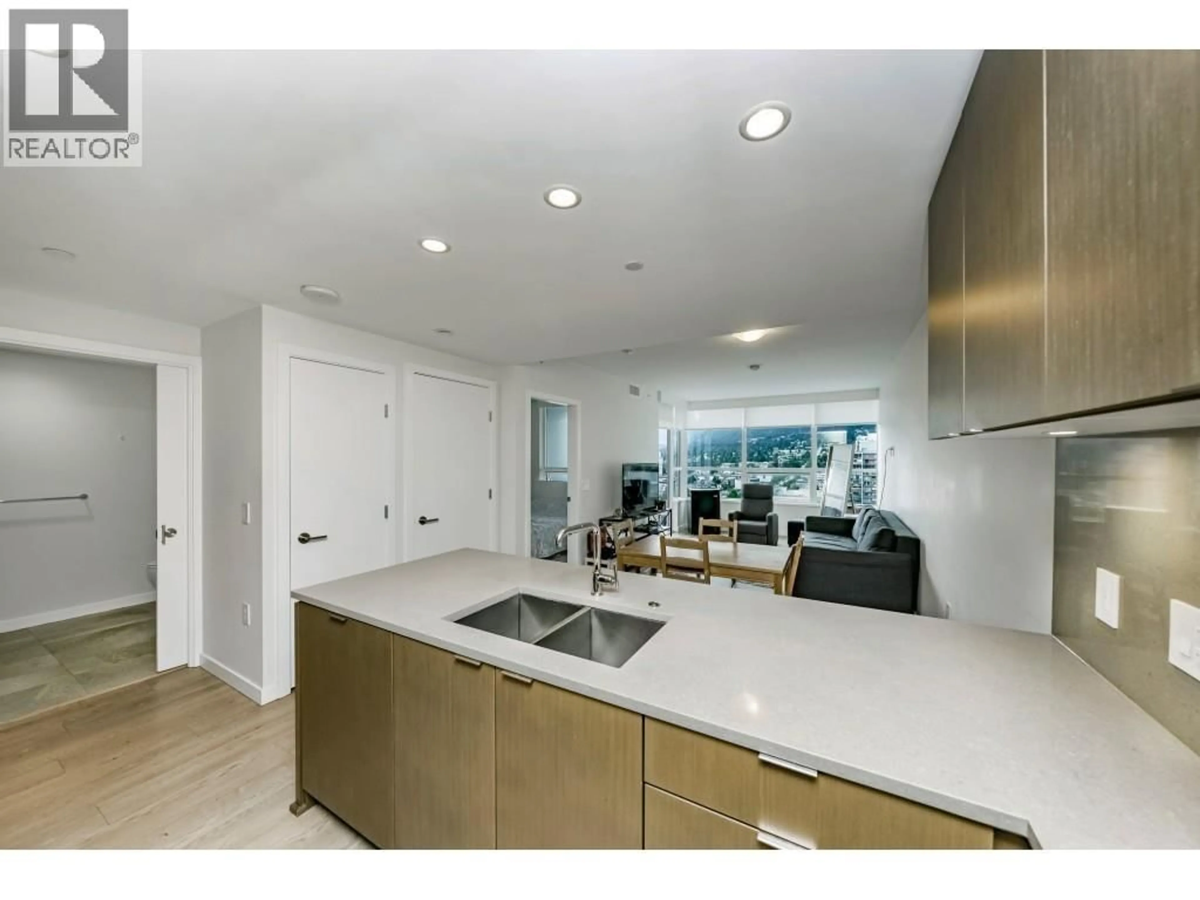 Open concept kitchen, ceramic/tile floor for 1401 - 112 13TH STREET, North Vancouver British Columbia V7L0E4