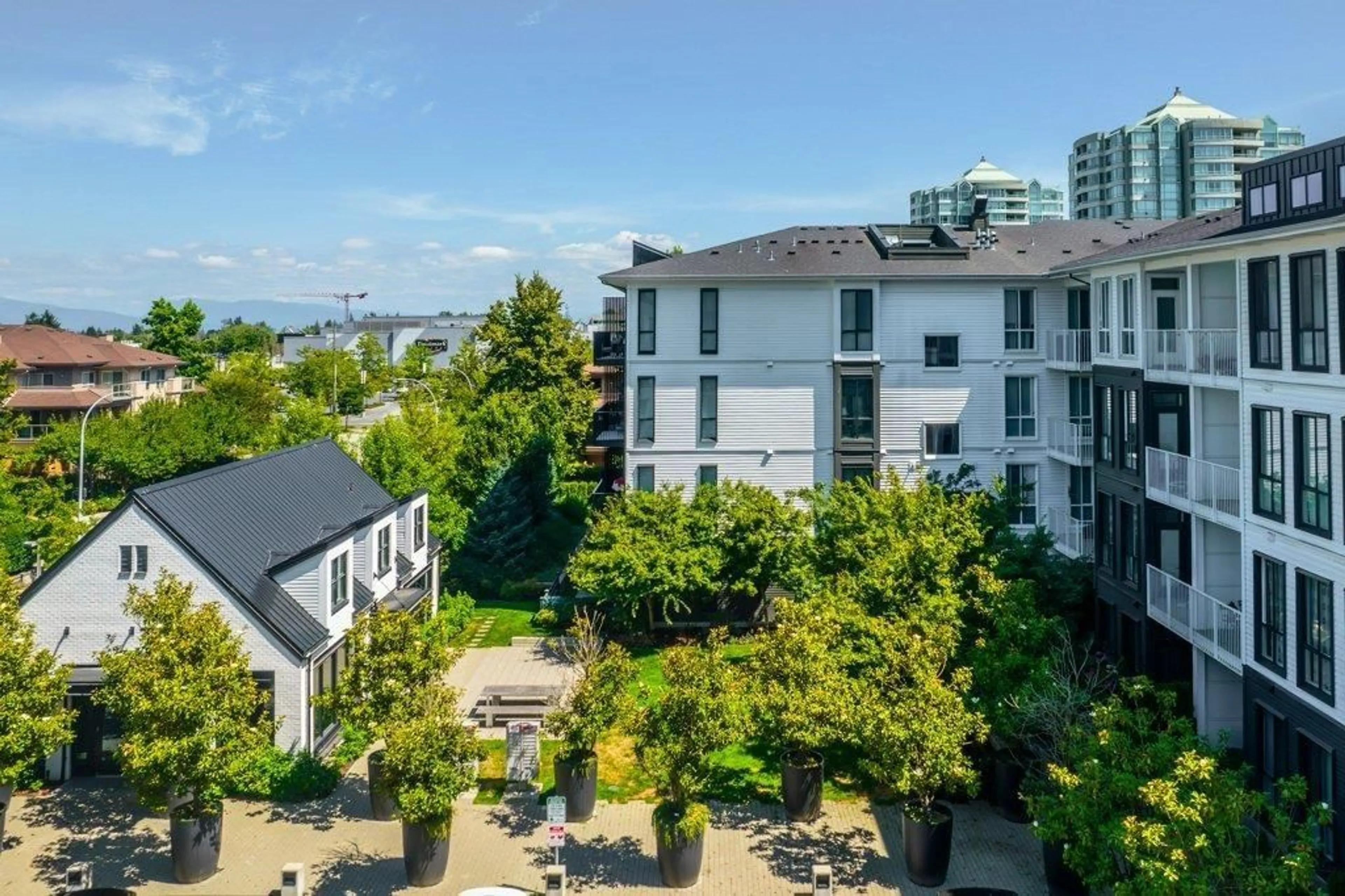 A pic from outside/outdoor area/front of a property/back of a property/a pic from drone, city buildings view from balcony for 413 - 14968 101A, Surrey British Columbia V3R0E8