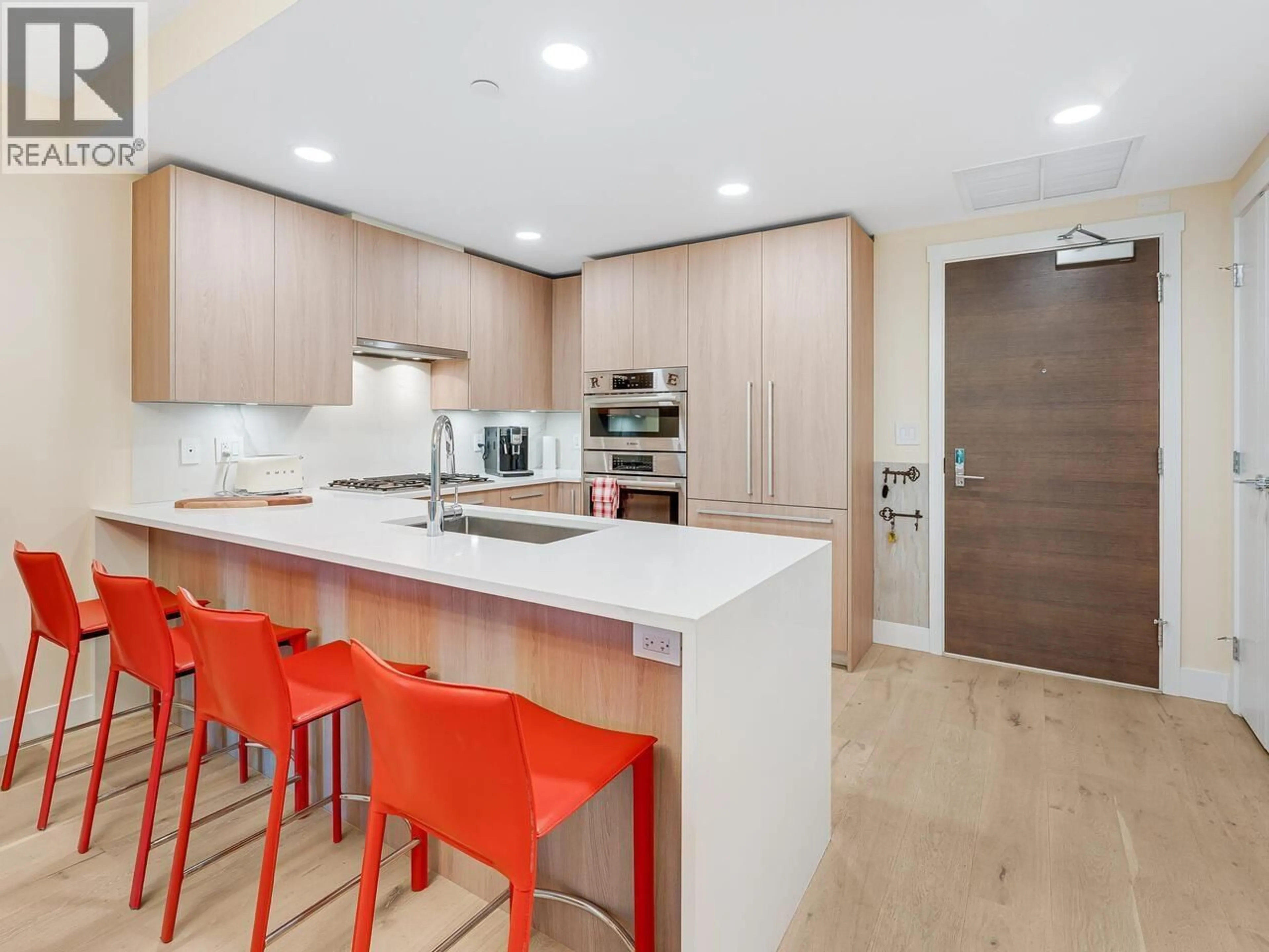 Open concept kitchen, unknown for 308 - 2707 LIBRARY LANE, North Vancouver British Columbia V7J0C6
