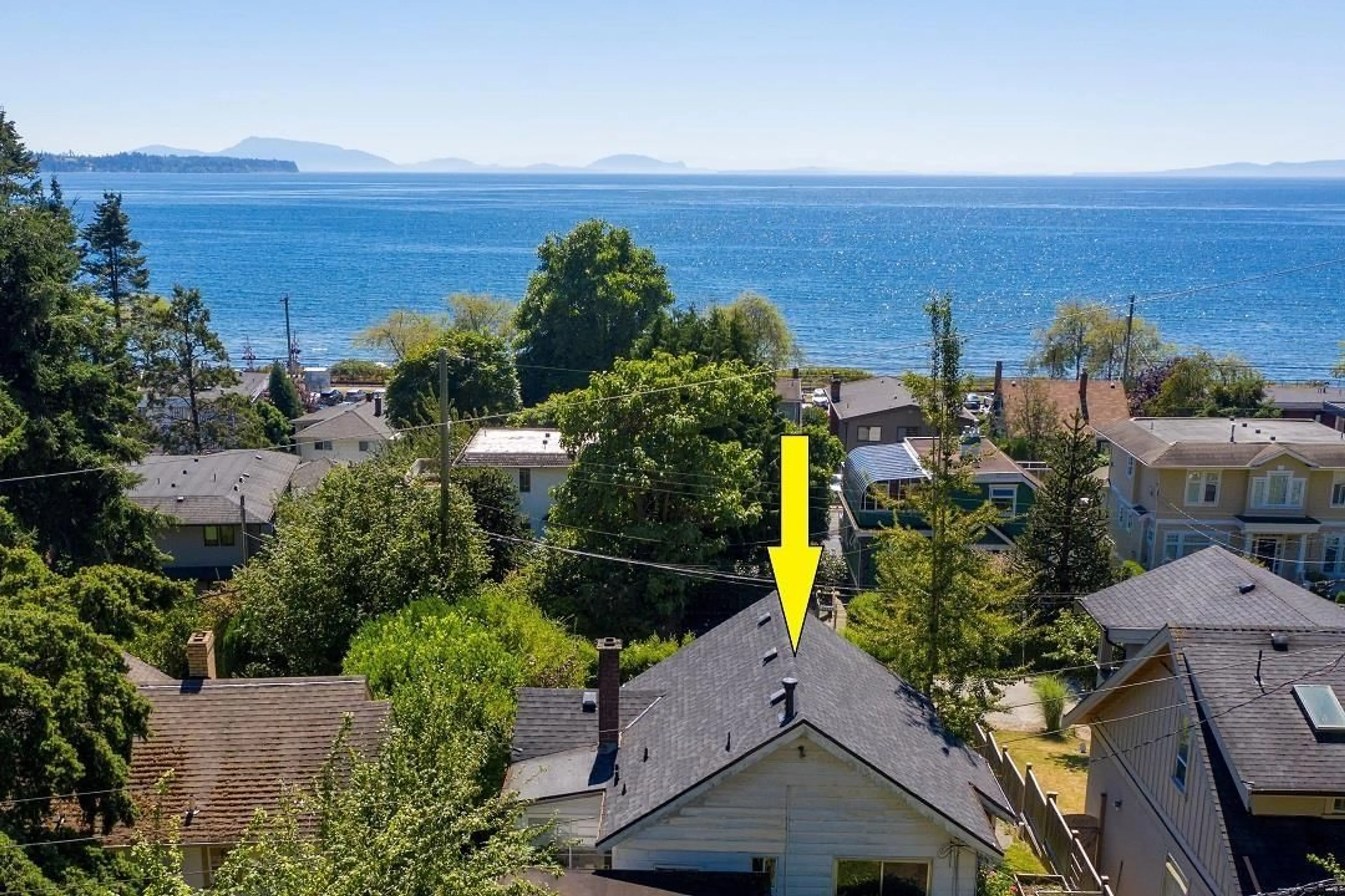 A pic from outside/outdoor area/front of a property/back of a property/a pic from drone, water/lake/river/ocean view for 14683 WEST BEACH, White Rock British Columbia V4B2T9