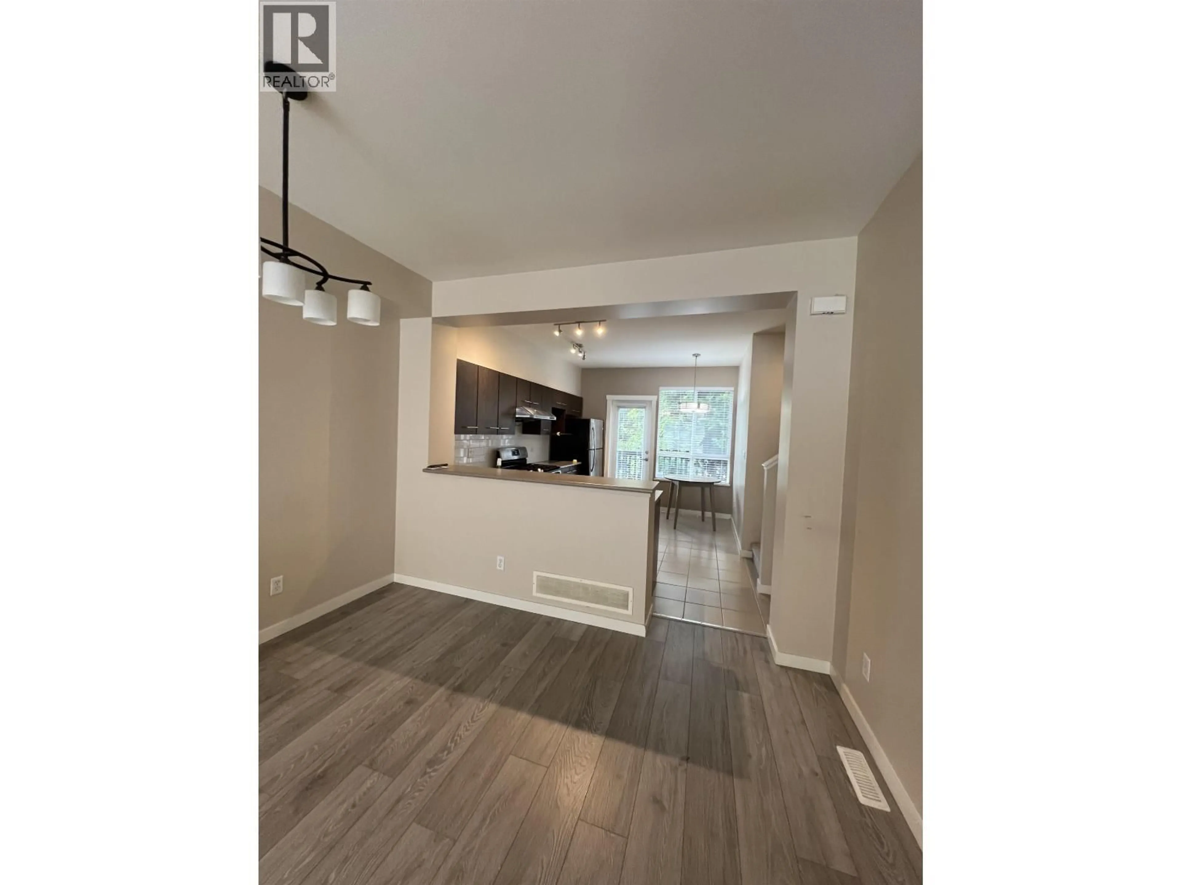 Open concept kitchen, wood/laminate floor for 27 - 9133 SILLS AVENUE, Richmond British Columbia V6Y4H6