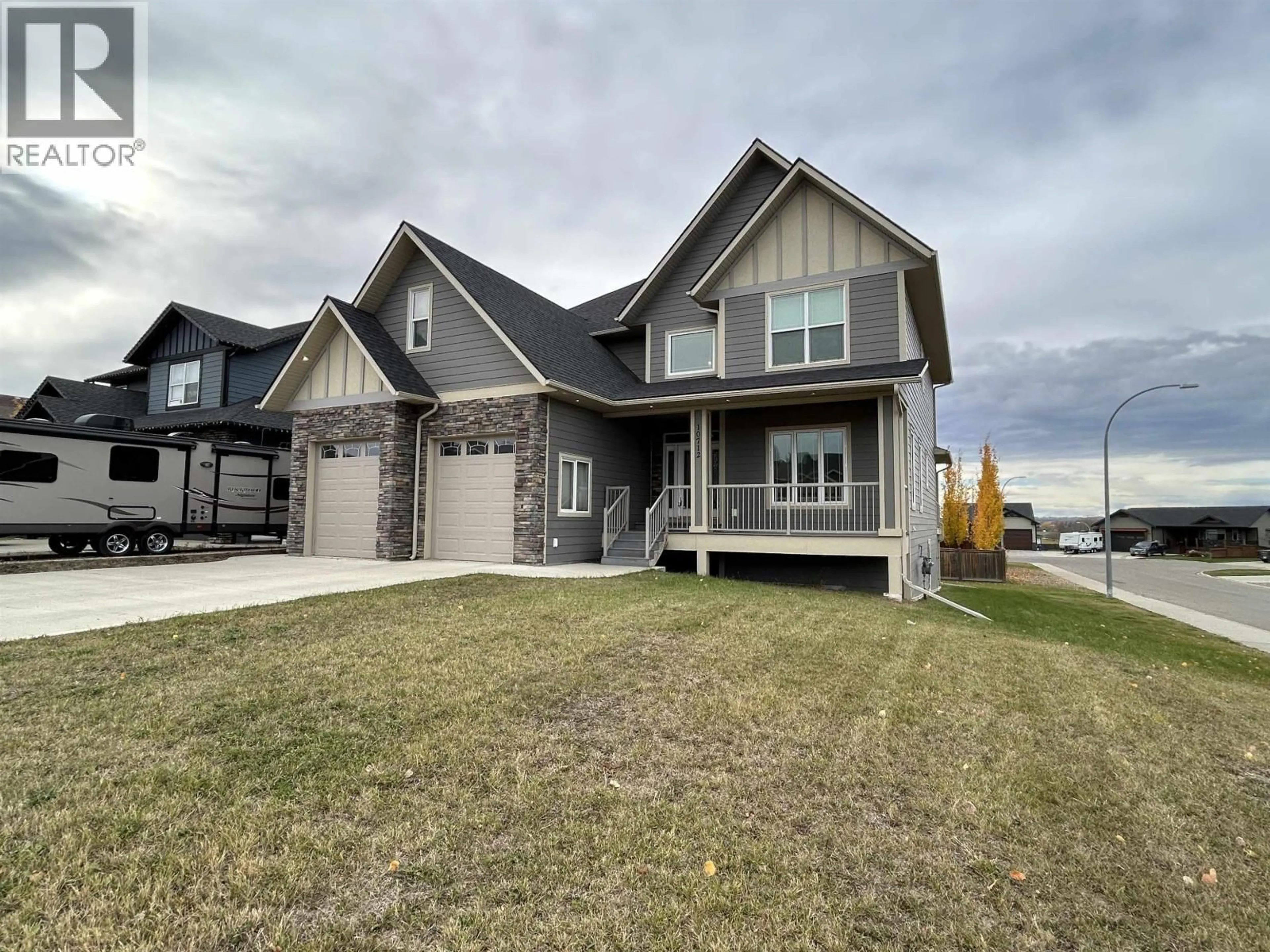 Home with vinyl exterior material, street for 10712 109 STREET, Fort St. John British Columbia V1J0J3
