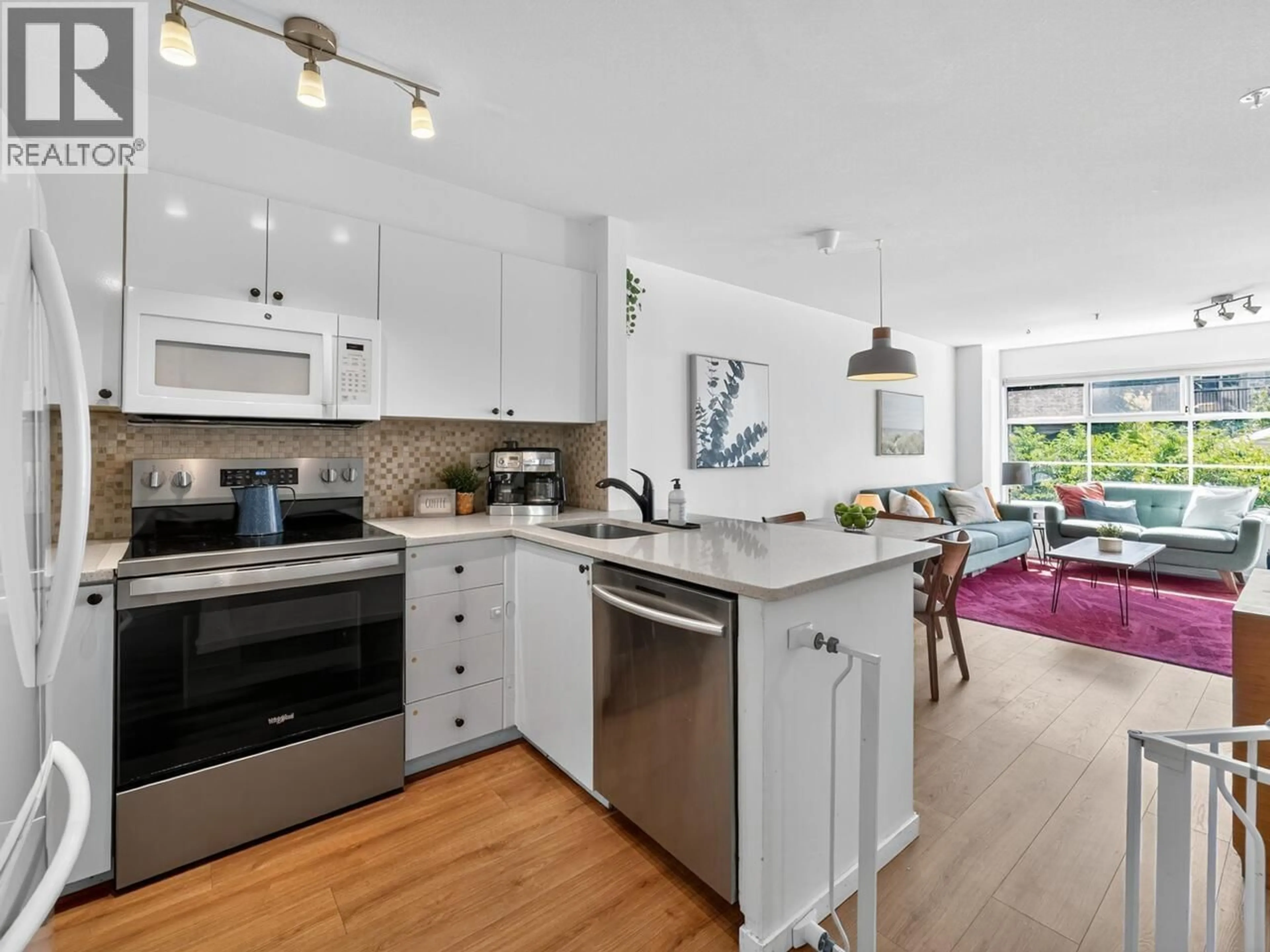 Open concept kitchen, unknown for 302 - 2388 TRIUMPH STREET, Vancouver British Columbia V5L1L5