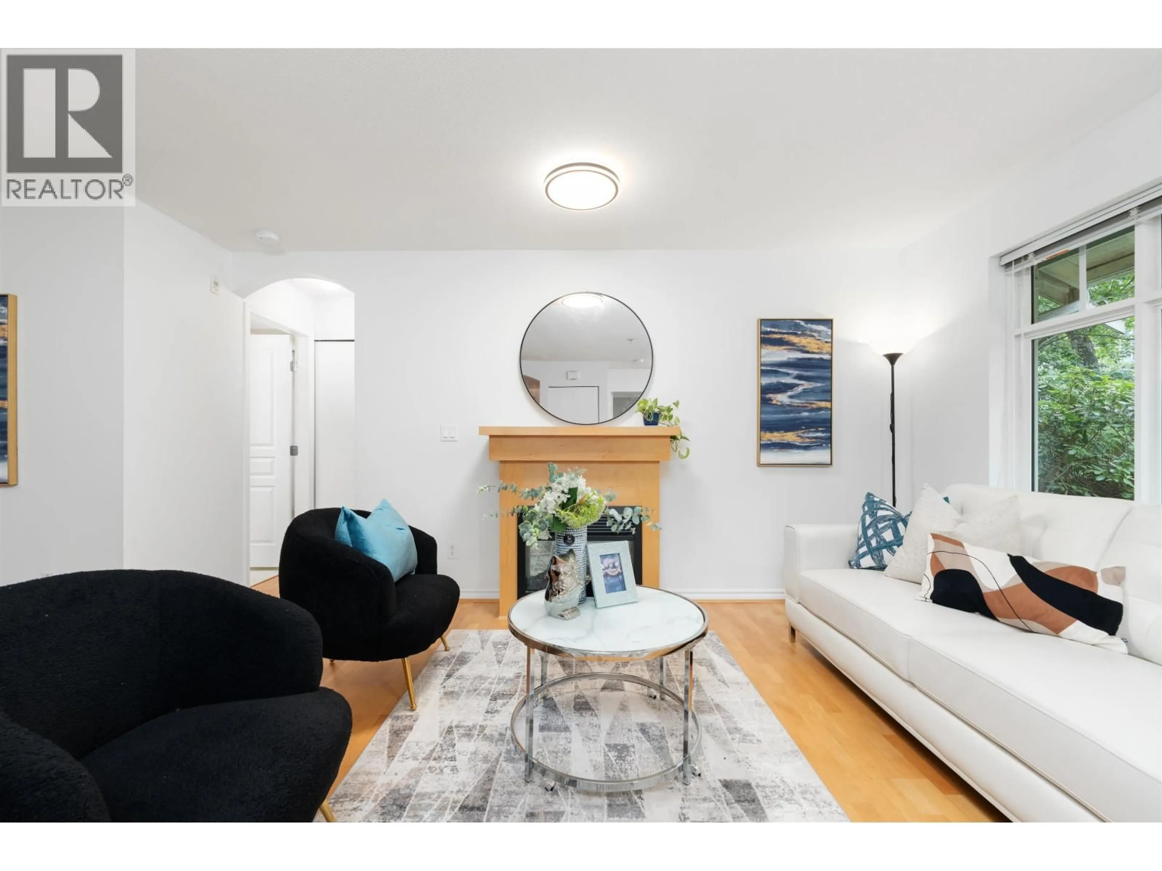 Living room with furniture, wood/laminate floor for 51 - 7488 SOUTHWYNDE AVENUE, Burnaby British Columbia V3N5C6