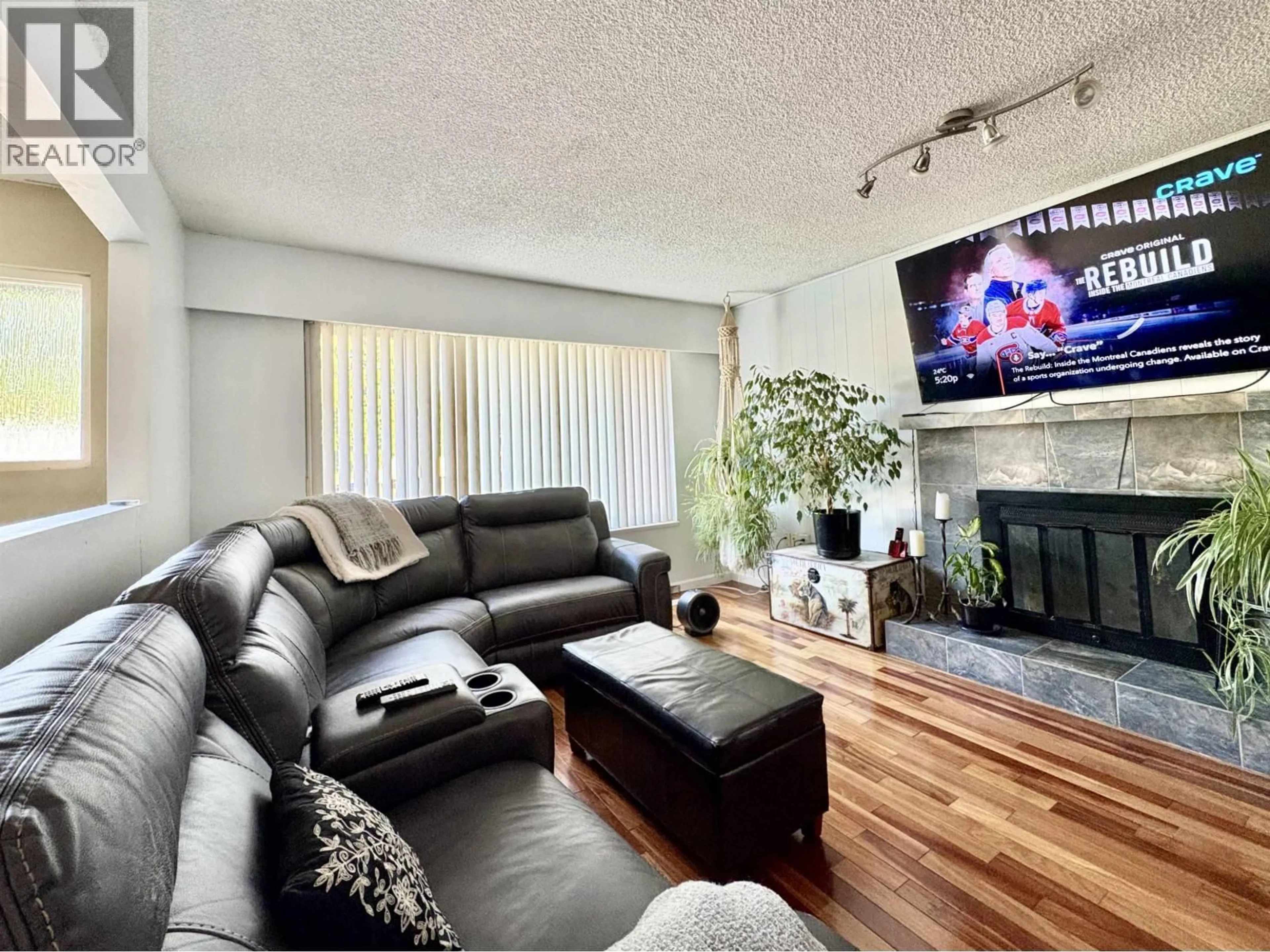 Living room with furniture, wood/laminate floor for 11717 209TH STREET, Maple Ridge British Columbia V2X7S6