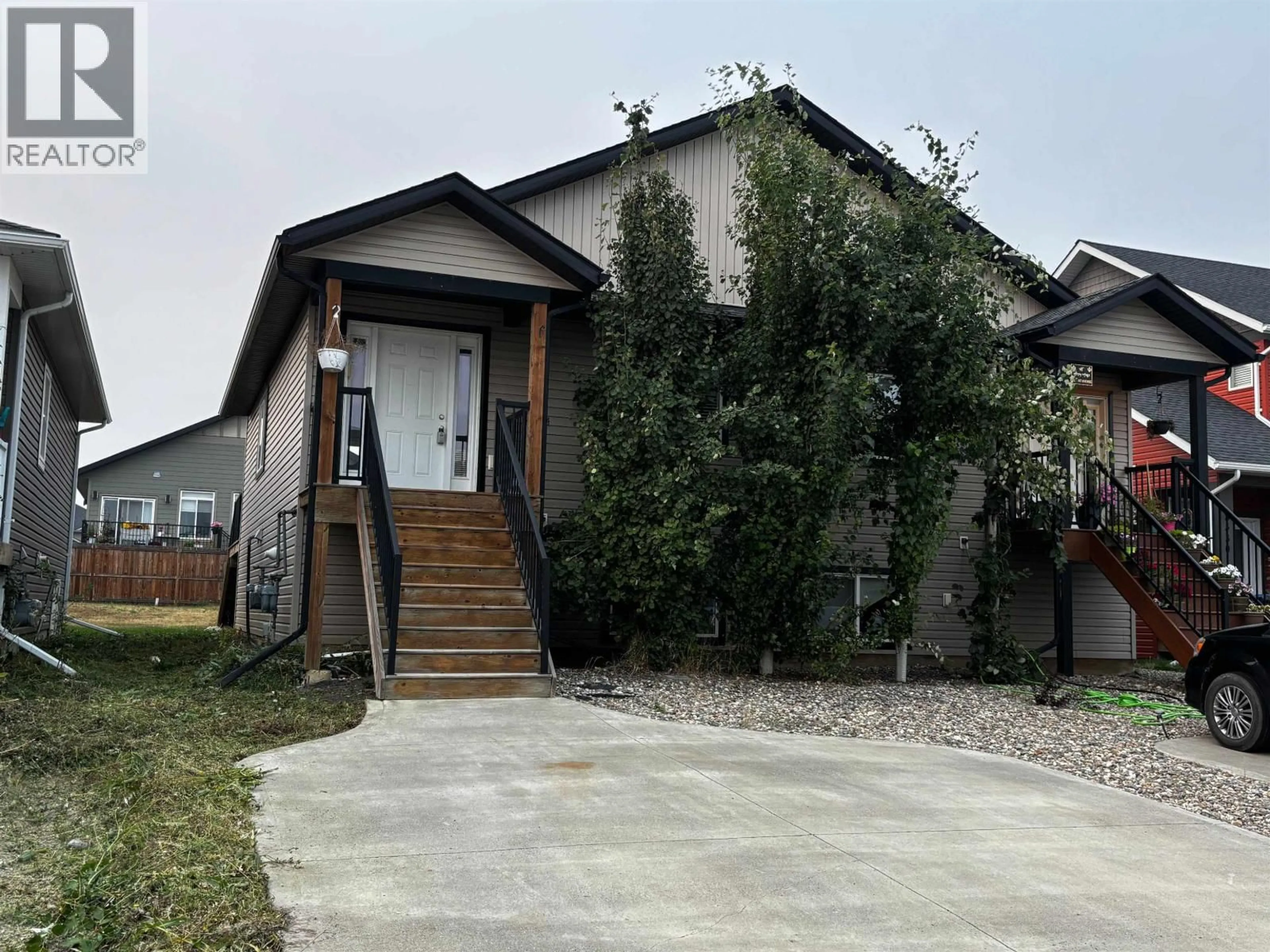 Home with vinyl exterior material, unknown for 8334 87 AVENUE, Fort St. John British Columbia V1J0K8