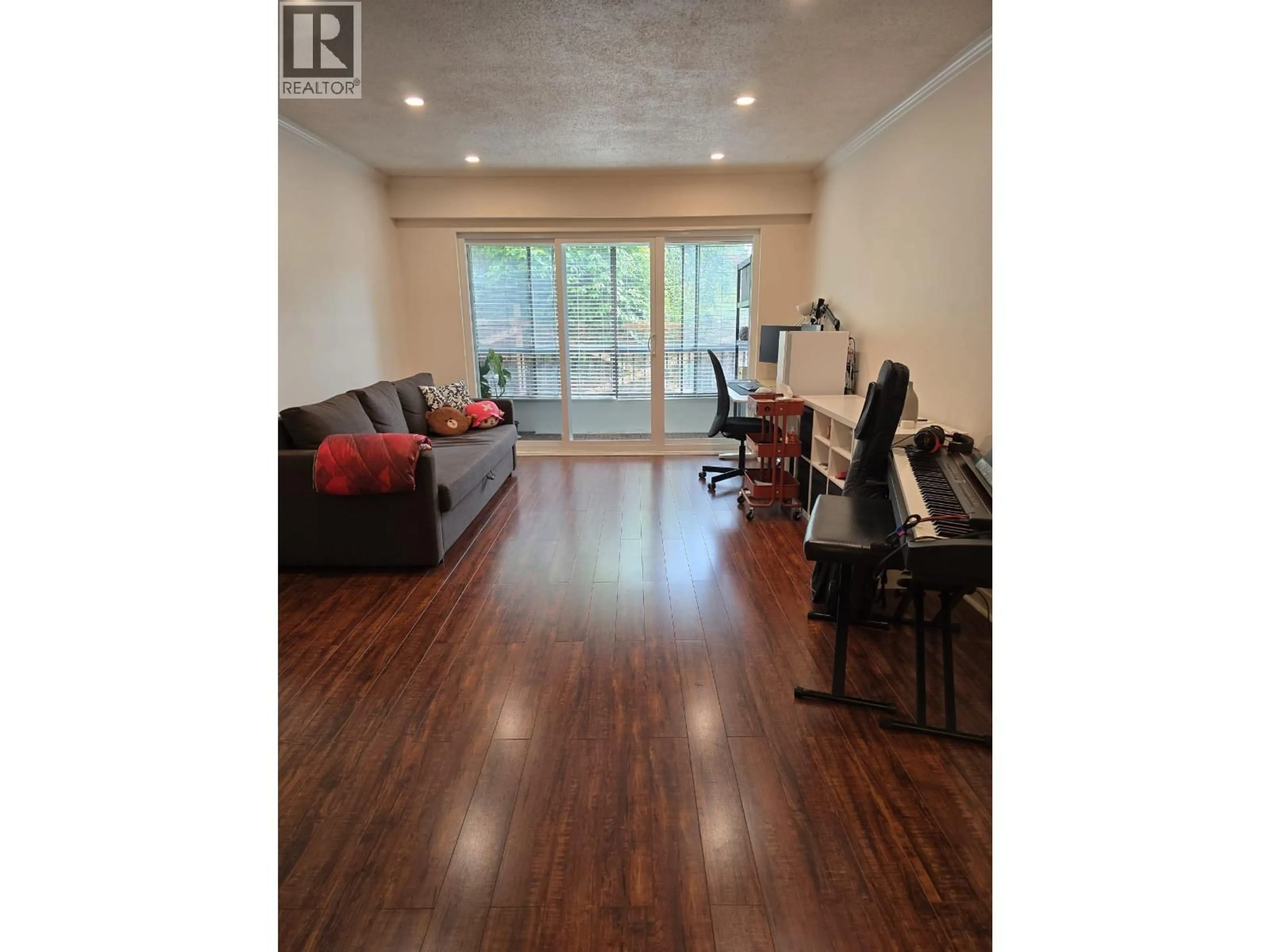 Living room with furniture, wood/laminate floor for 111 - 3787 4TH AVENUE, Vancouver British Columbia V6R1P4