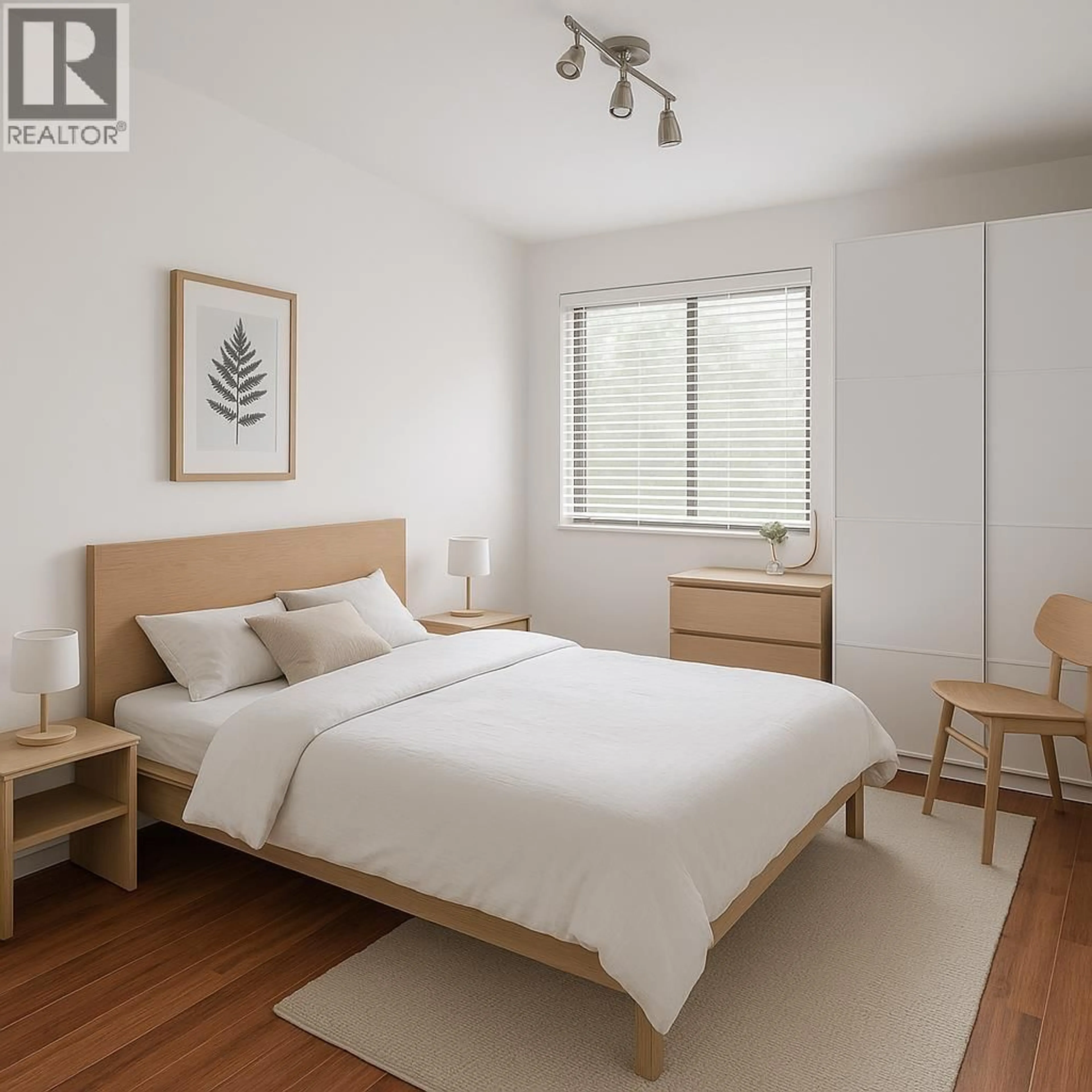 Bedroom with bed, wood/laminate floor for 111 - 3787 4TH AVENUE, Vancouver British Columbia V6R1P4