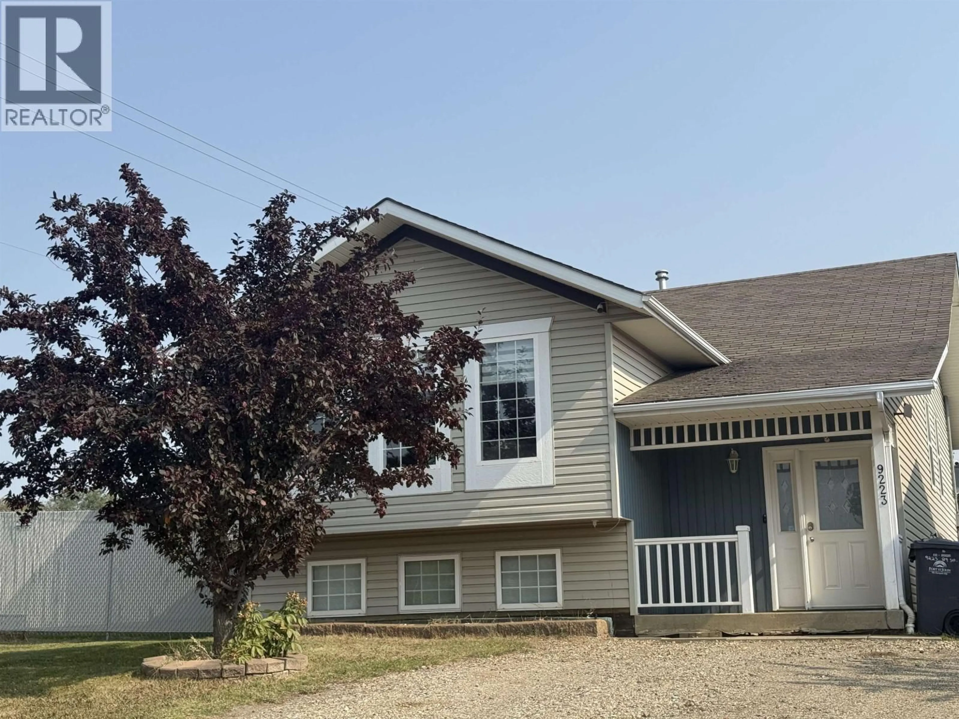 Home with vinyl exterior material, street for 9223 89 STREET, Fort St. John British Columbia V1J4Z3