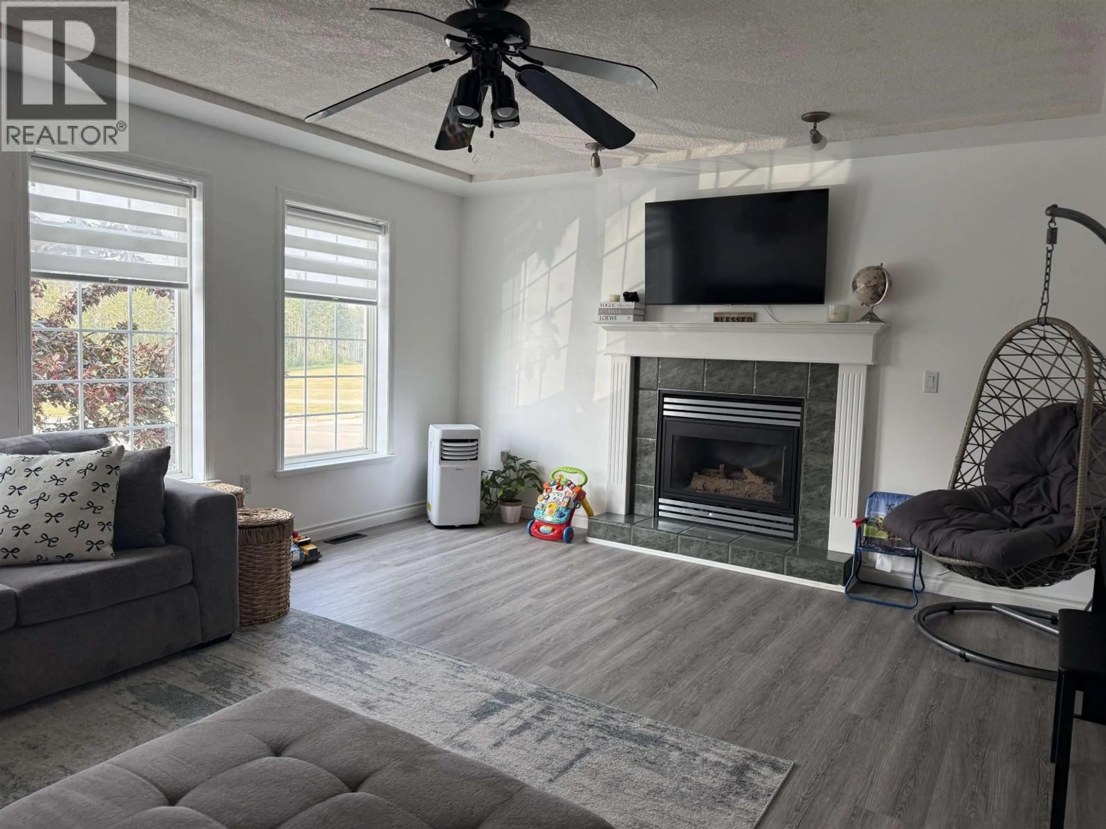 Living room with furniture, unknown for 9223 89 STREET, Fort St. John British Columbia V1J4Z3