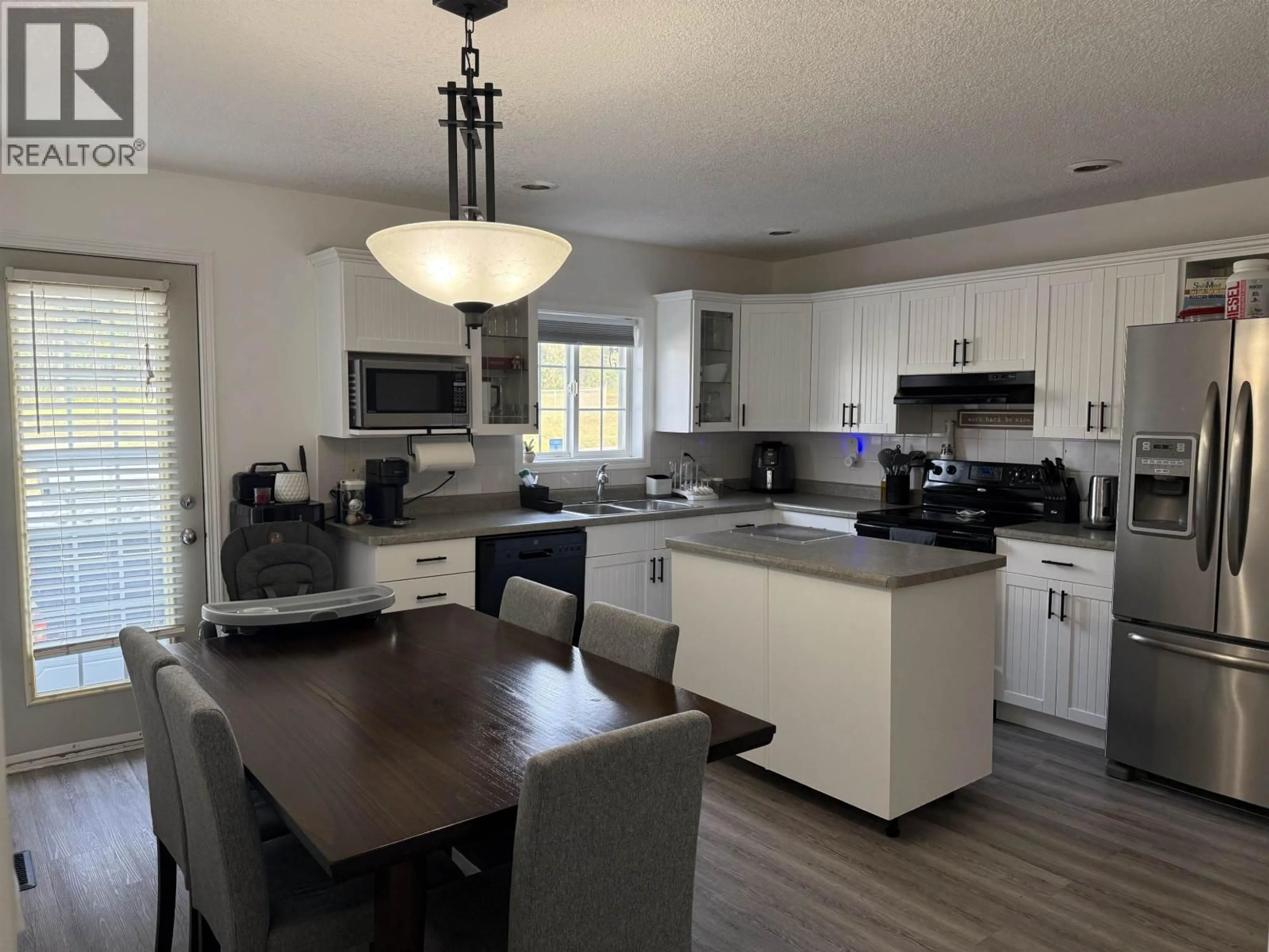 Open concept kitchen, unknown for 9223 89 STREET, Fort St. John British Columbia V1J4Z3