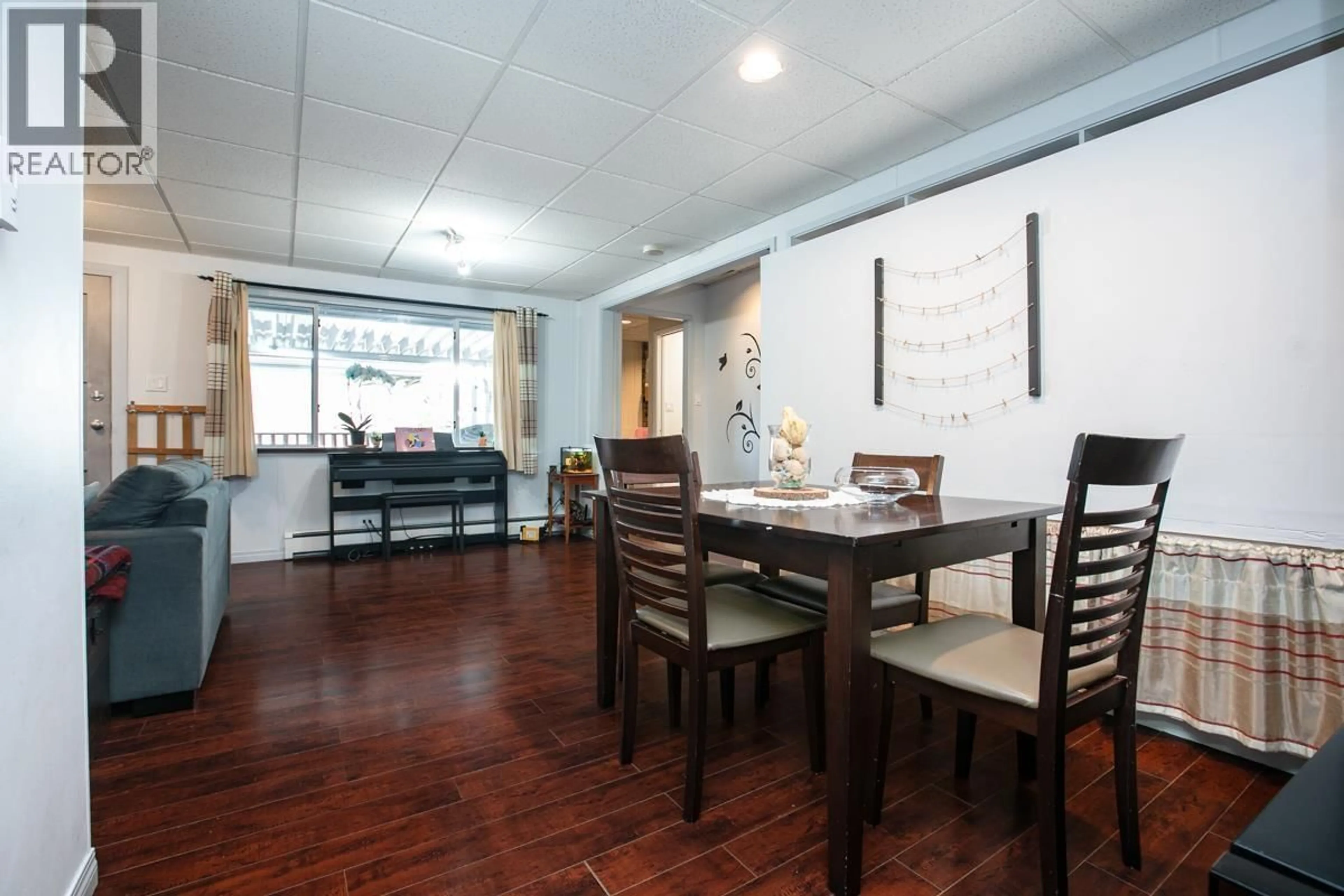 Dining room, wood/laminate floor for 2135 NEWPORT AVENUE, Vancouver British Columbia V5P2H9
