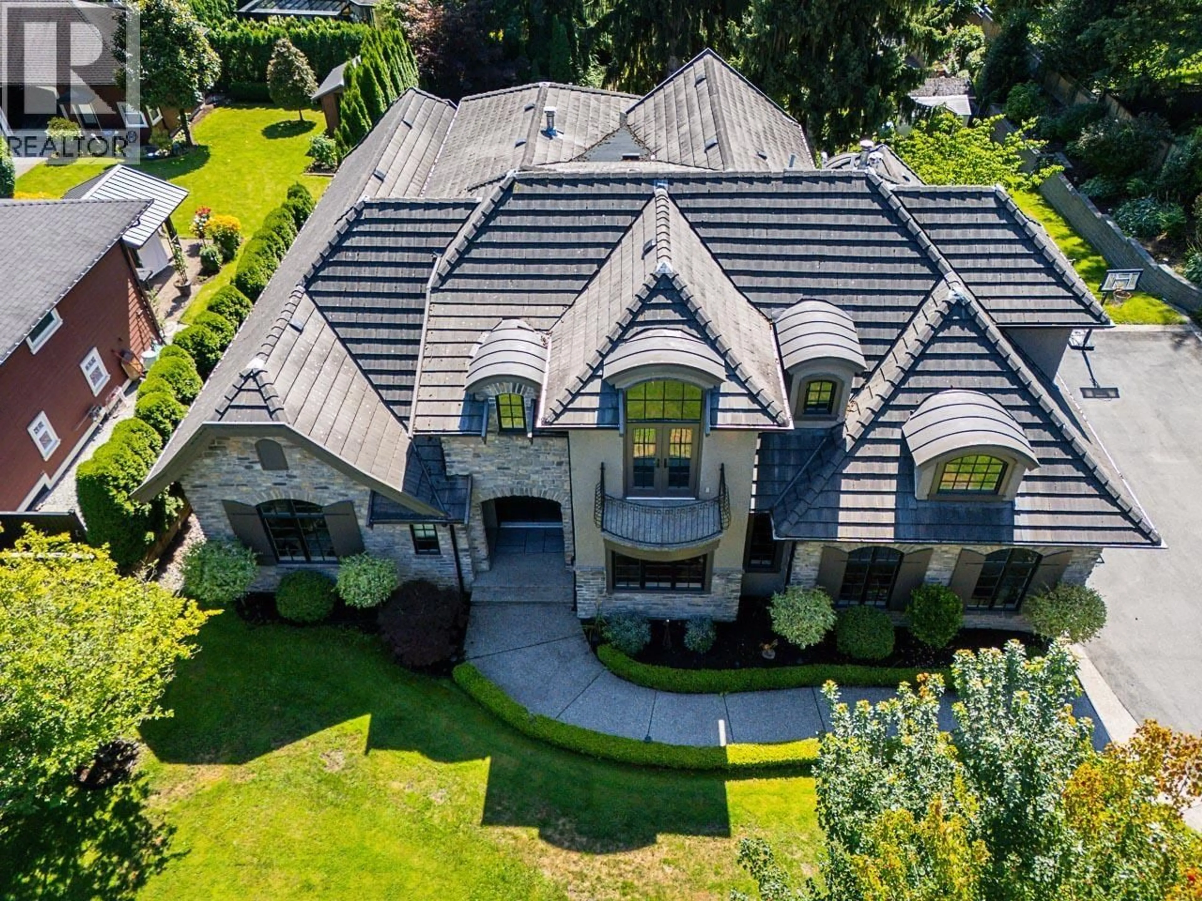 A pic from outside/outdoor area/front of a property/back of a property/a pic from drone, street for 8032 GOVERNMENT ROAD, Burnaby British Columbia V5A2E2