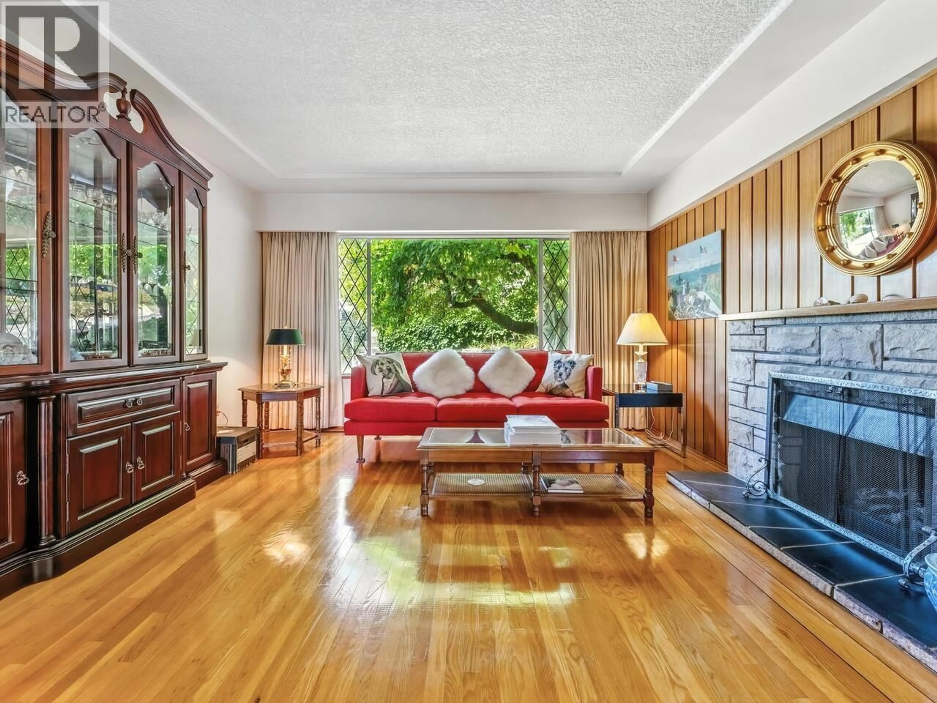 Living room with furniture, wood/laminate floor for 2354 HARRISON DRIVE, Vancouver British Columbia V5P2P8