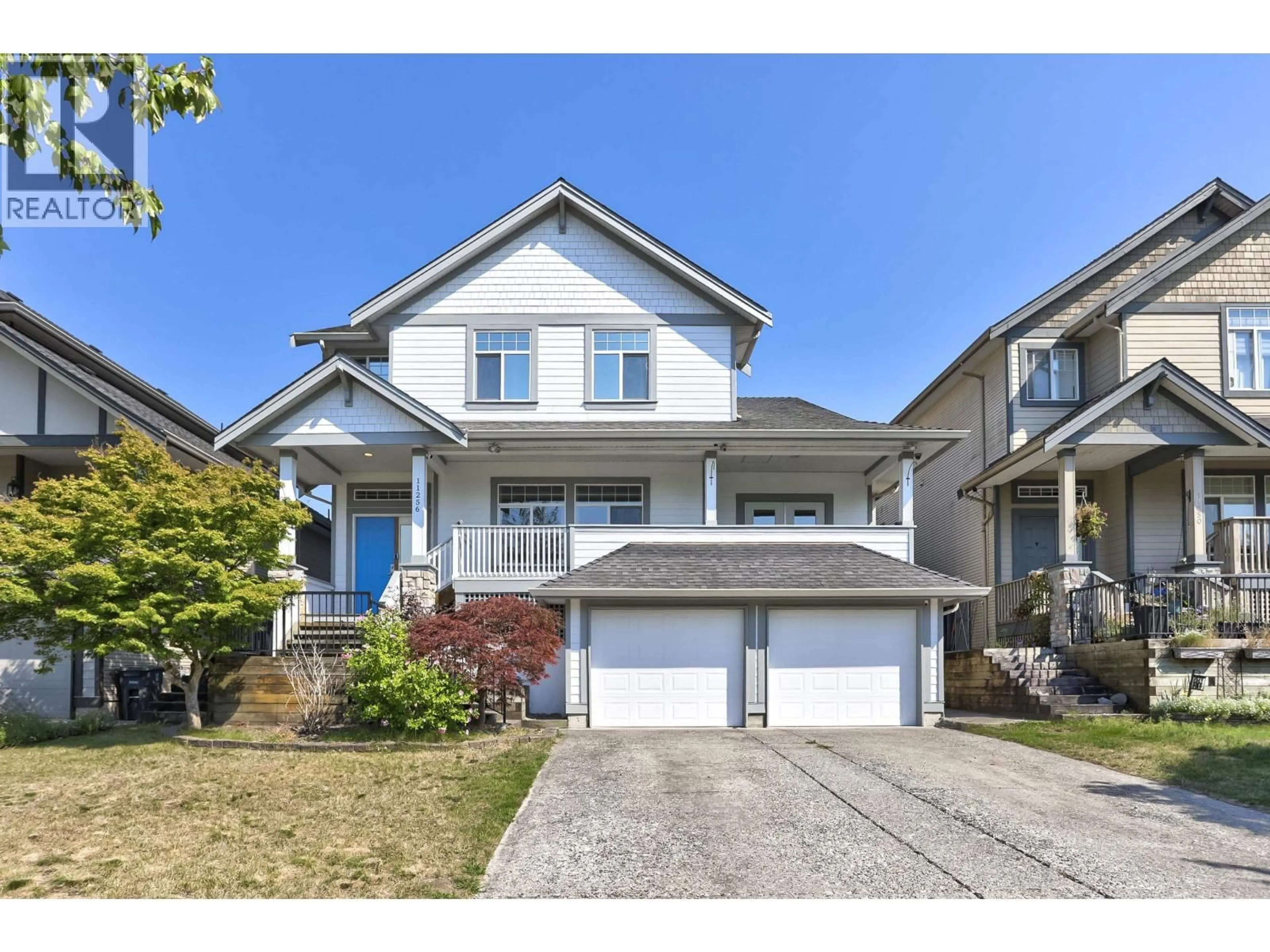Home with vinyl exterior material, street for 11256 BONSON ROAD, Pitt Meadows British Columbia V3Y2V3