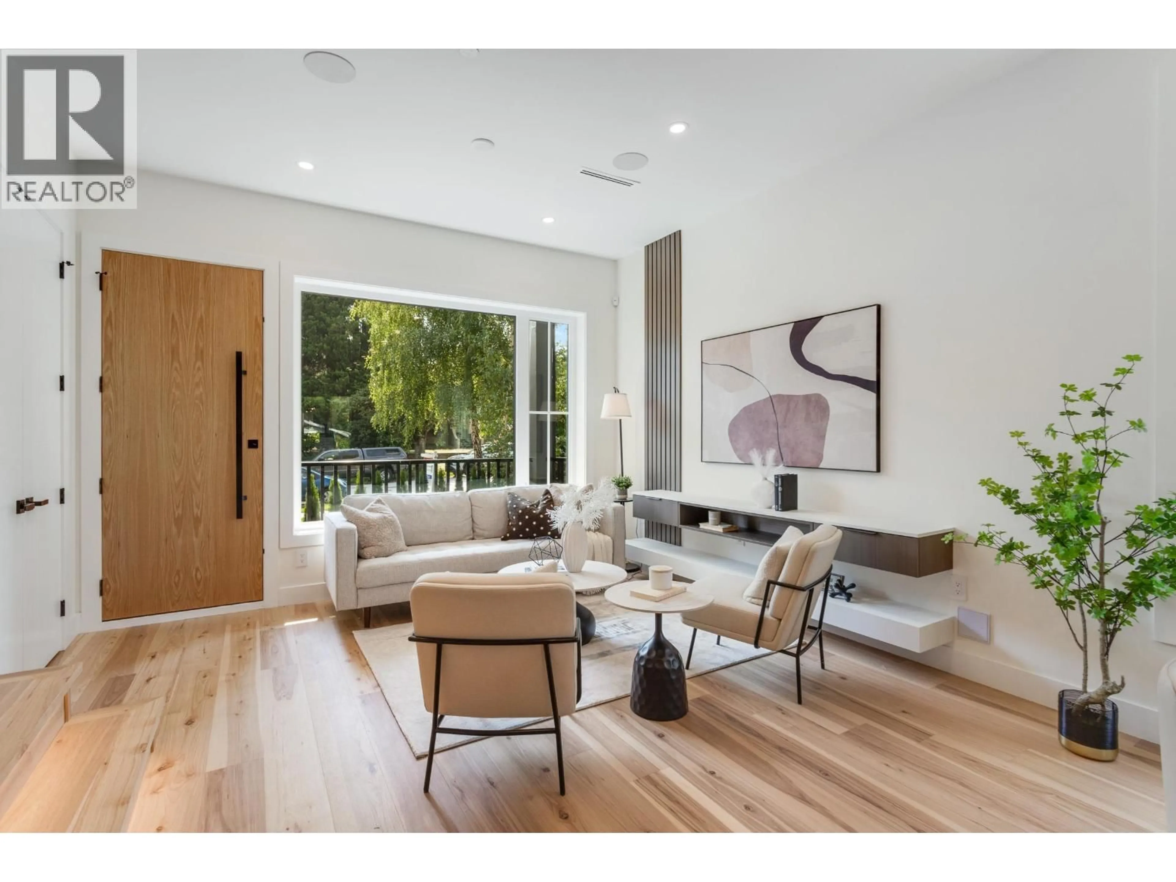 Living room with furniture, wood/laminate floor for 2837 31ST AVENUE, Vancouver British Columbia V6L2A3