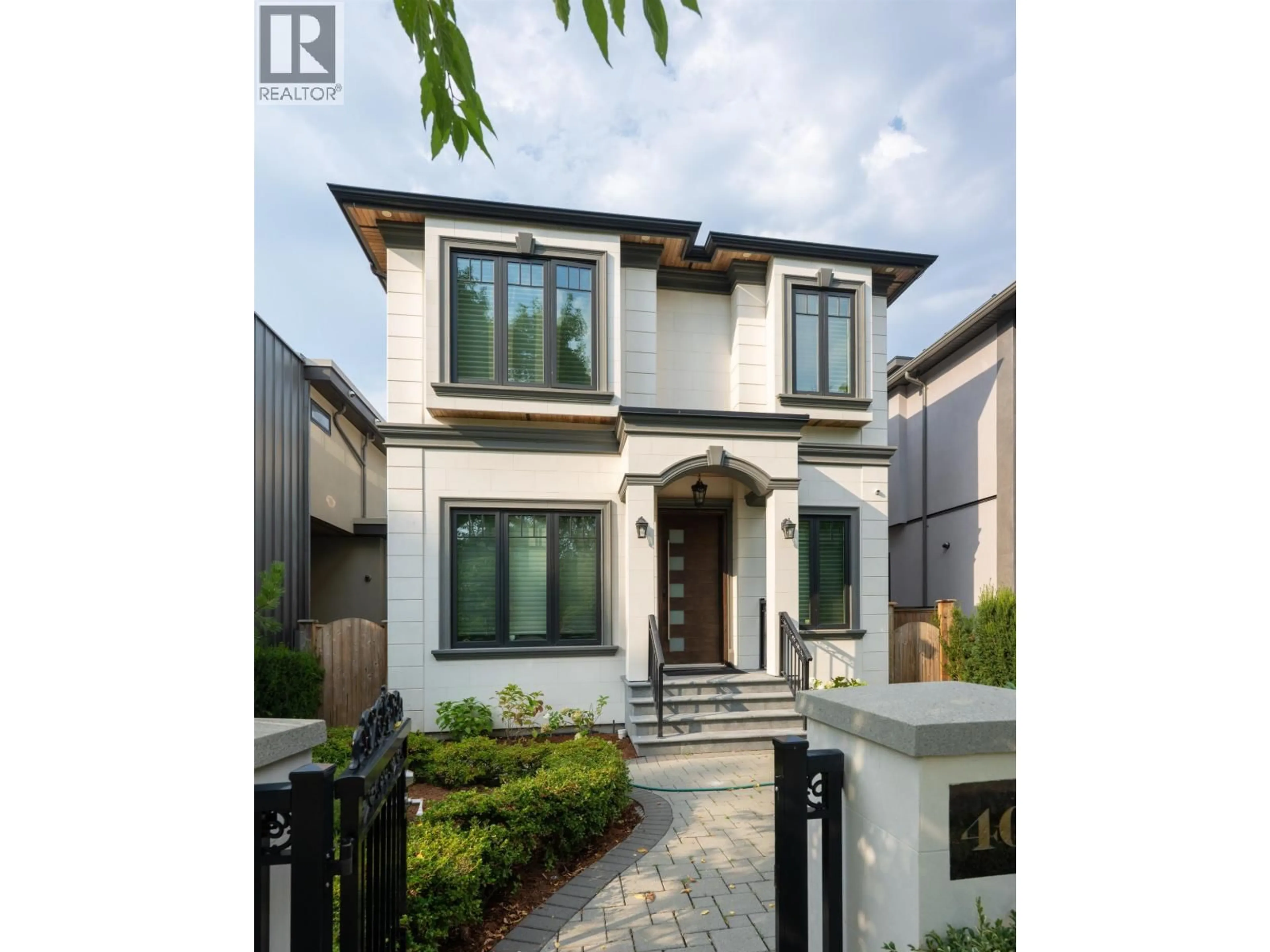 Home with brick exterior material, street for 4043 11TH AVENUE, Vancouver British Columbia V6R2L4