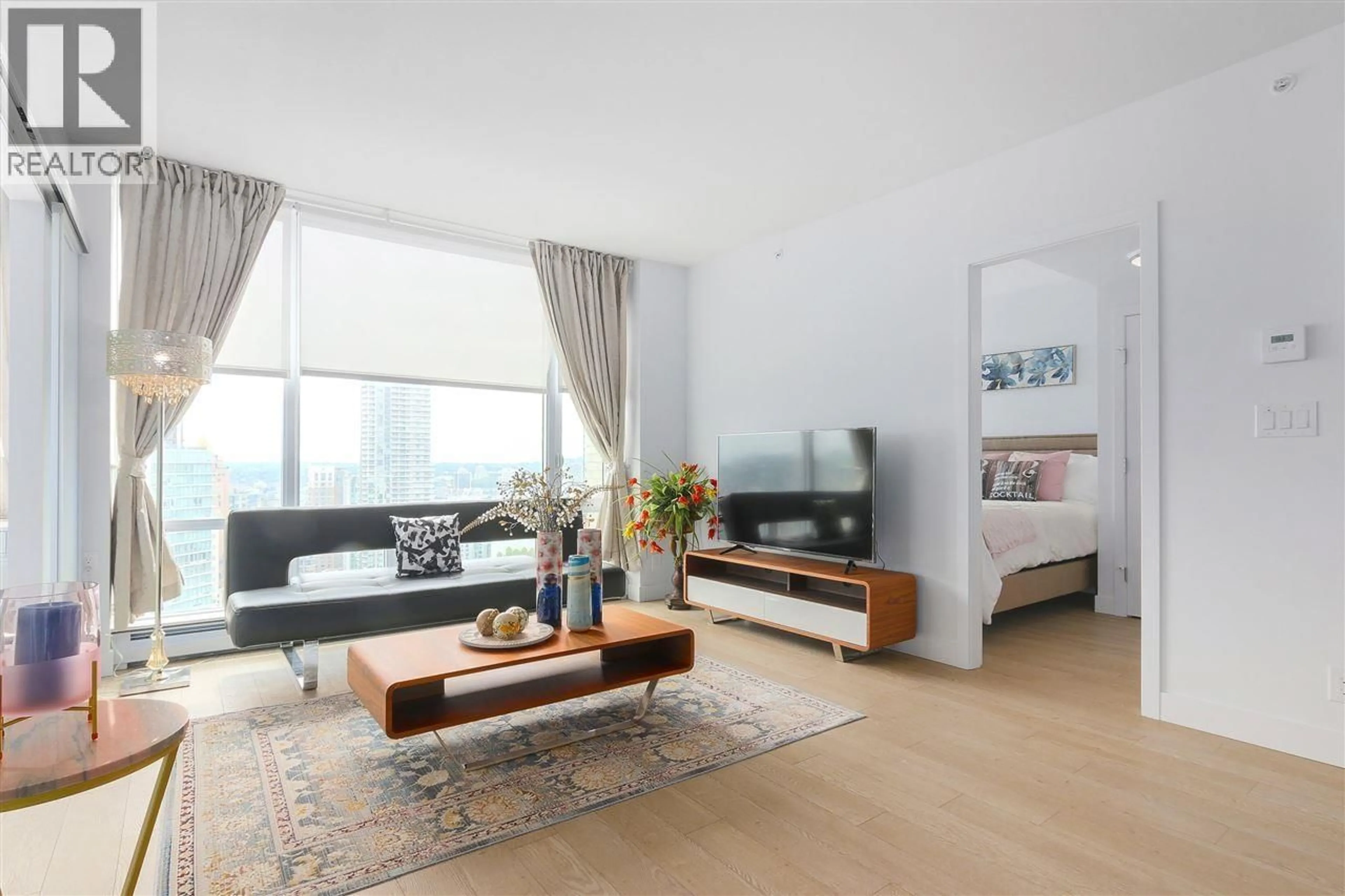 Living room with furniture, wood/laminate floor for 2904 - 1283 HOWE STREET, Vancouver British Columbia V6Z0E3