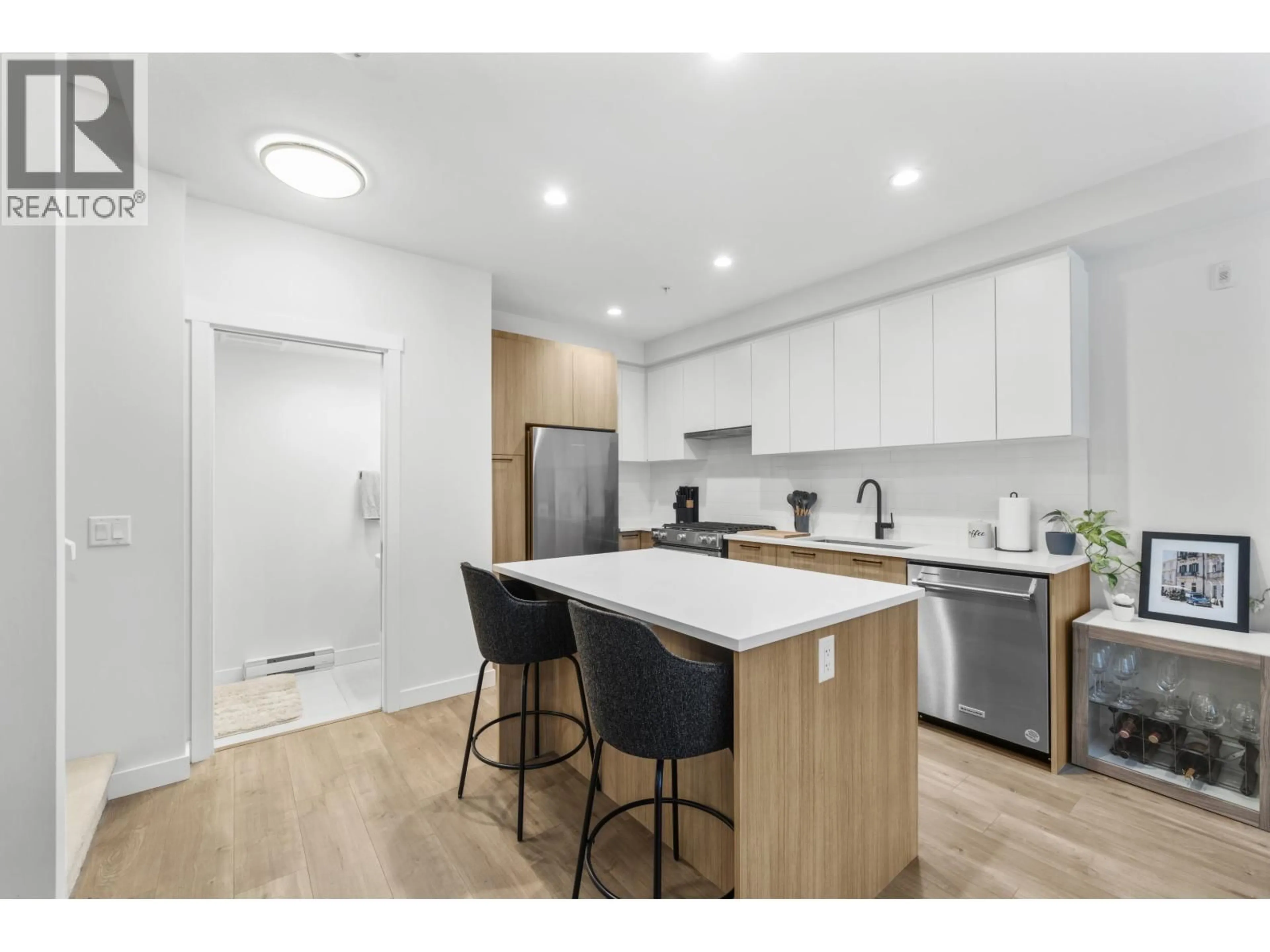 Open concept kitchen, wood/laminate floor for 214 - 708 LEA AVENUE, Coquitlam British Columbia V3J0K4