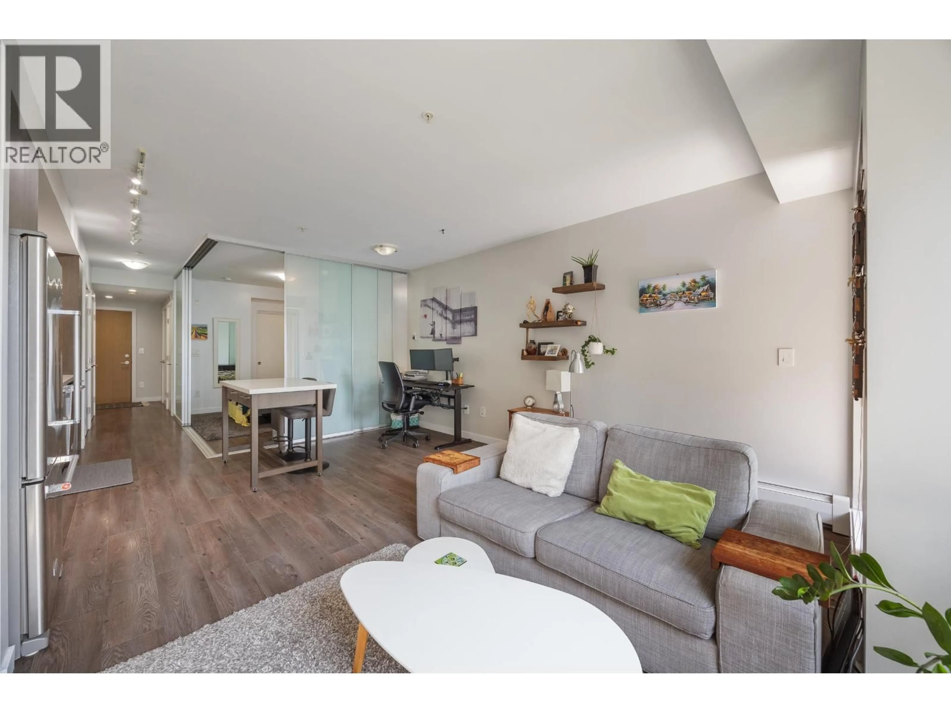 Living room with furniture, wood/laminate floor for 619 - 384 1ST AVENUE, Vancouver British Columbia V5T0G5