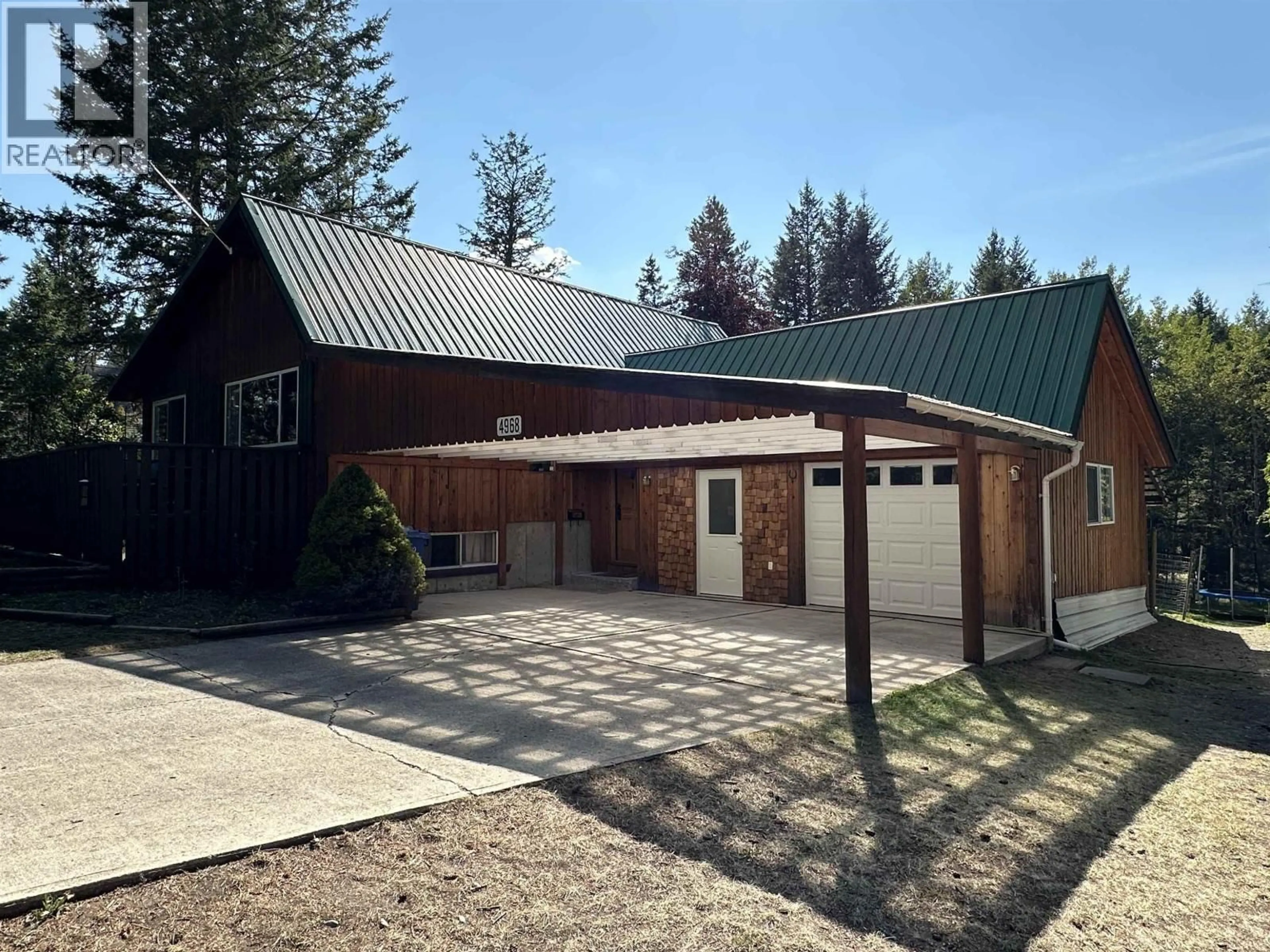 A pic from outside/outdoor area/front of a property/back of a property/a pic from drone, unknown for 4968 MONICAL ROAD, 108 Mile Ranch British Columbia V0K2Z0