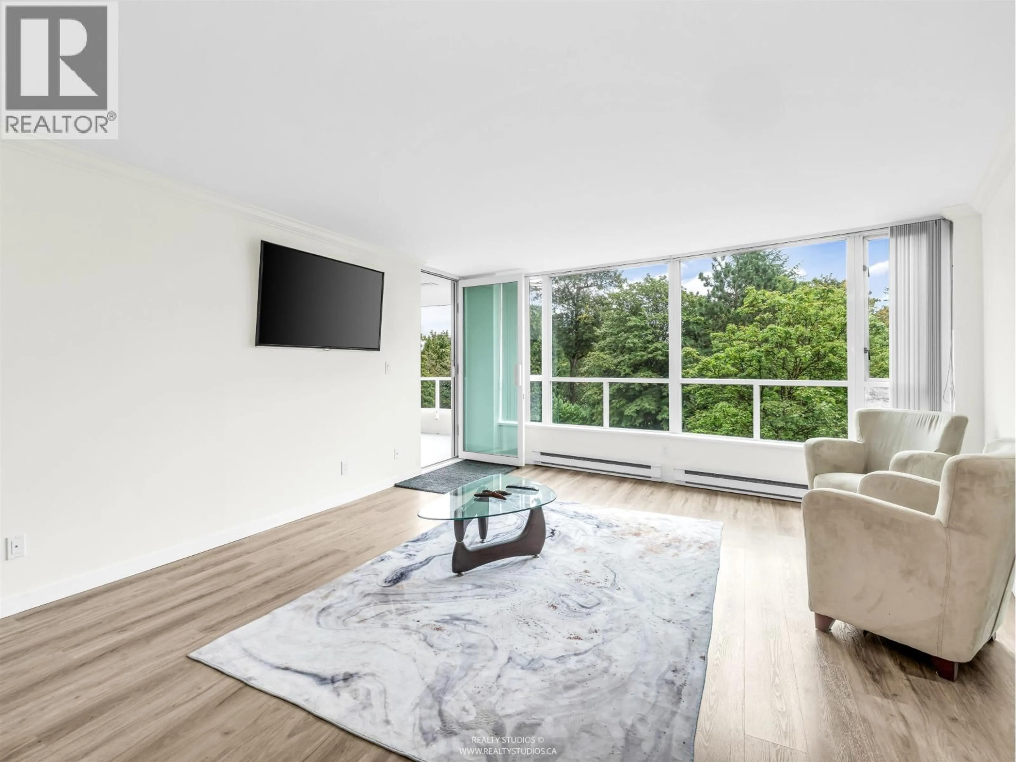 Living room with furniture, unknown for 406 - 995 ROCHE POINT DRIVE, North Vancouver British Columbia V7H2X4