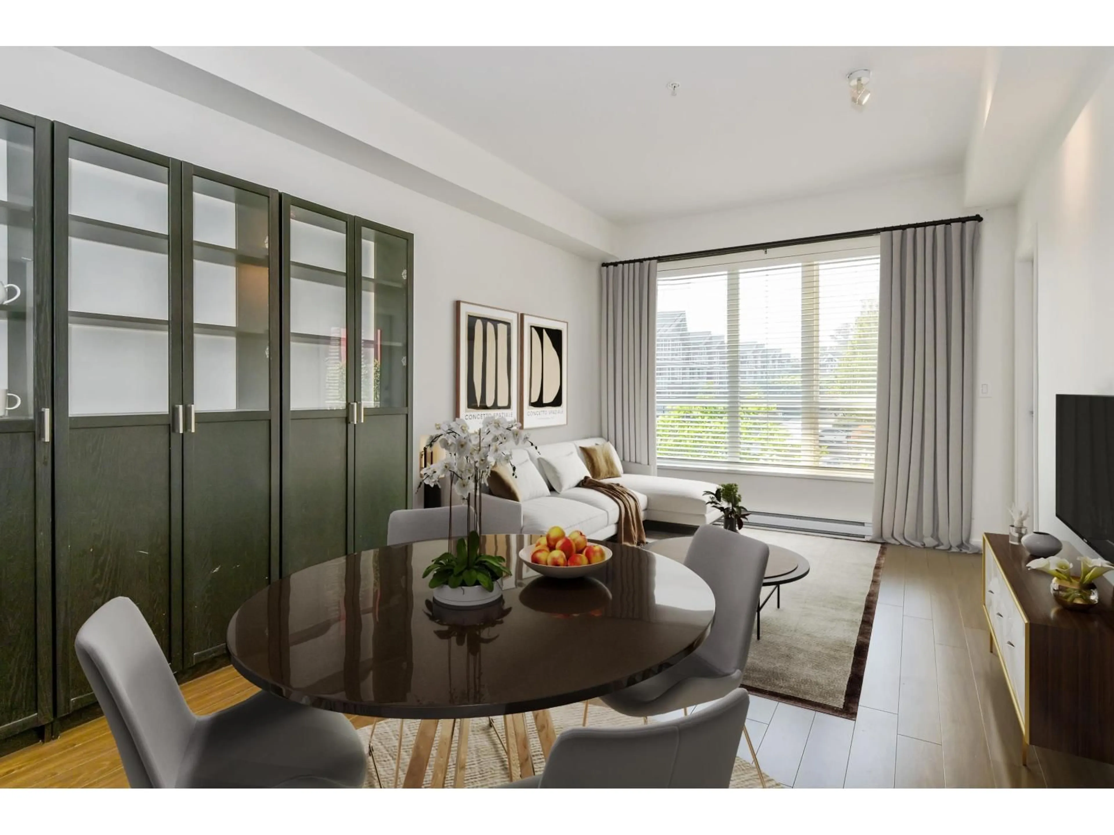 Living room with furniture, wood/laminate floor for 306 - 6450 194, Surrey British Columbia V4N6J8