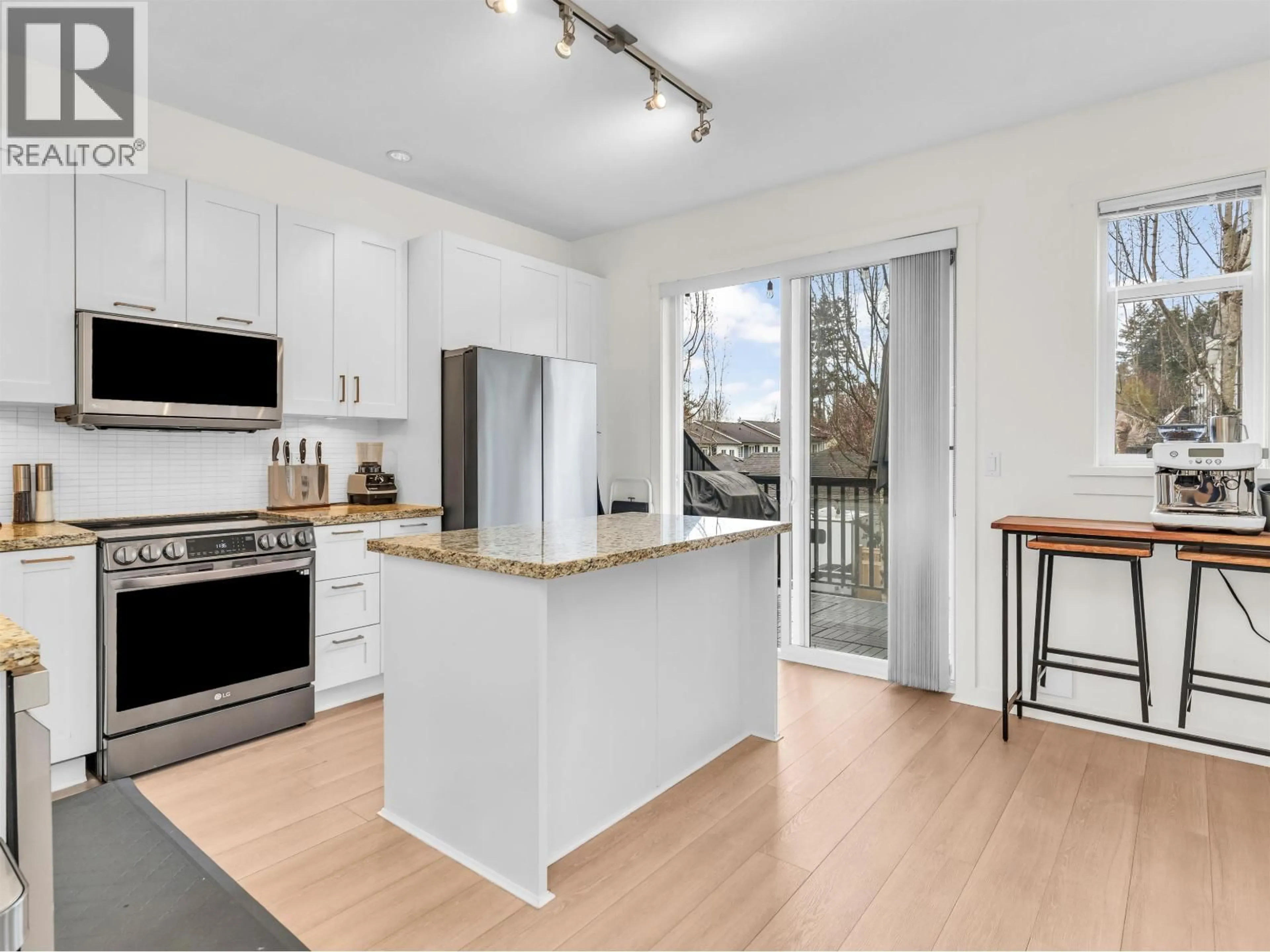 Open concept kitchen, wood/laminate floor for 11 - 1248 HOLTBY STREET, Coquitlam British Columbia V3B0E5