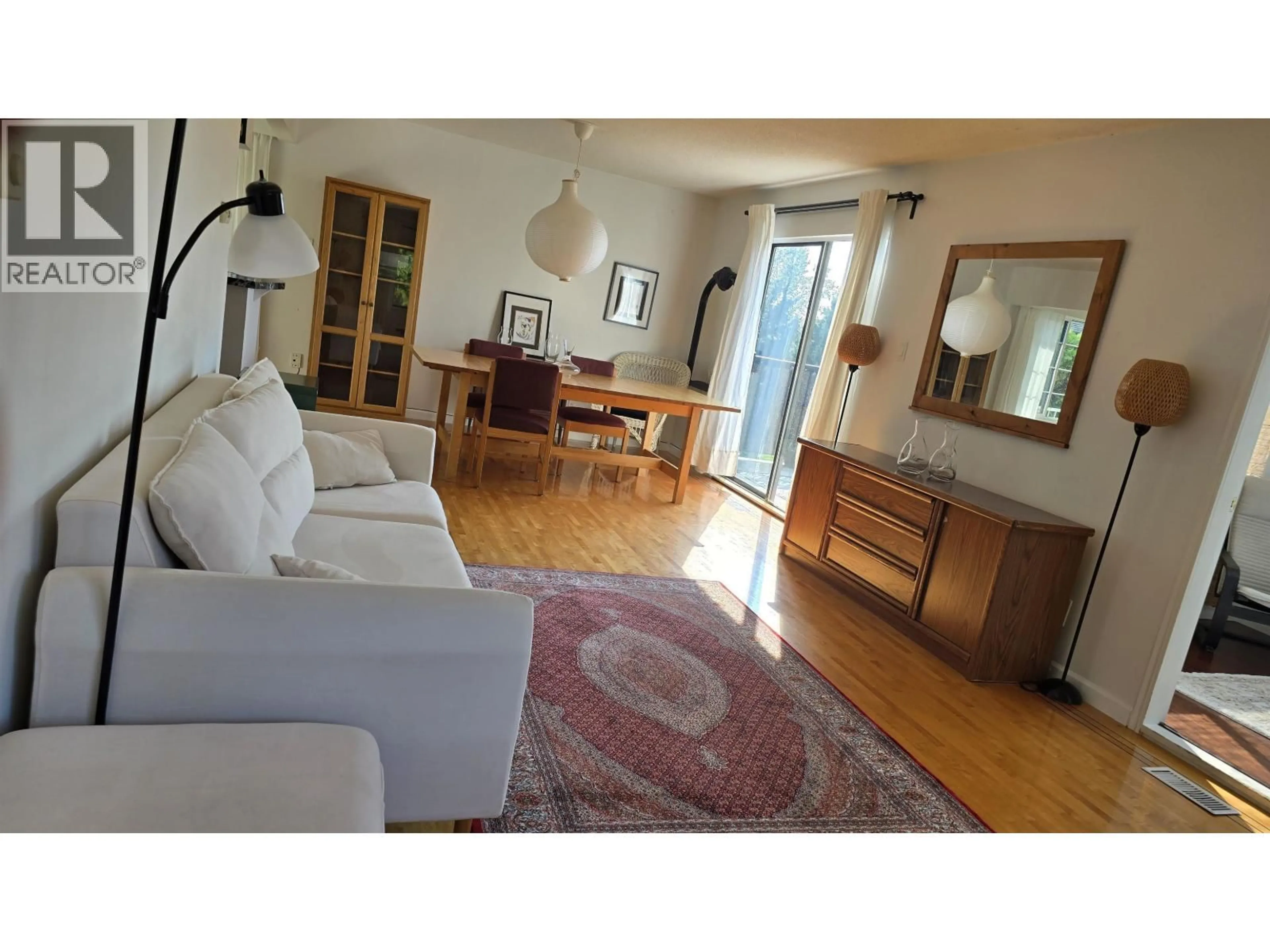 Living room with furniture, wood/laminate floor for 1479 ELINOR CRESCENT, Port Coquitlam British Columbia V3C6M5