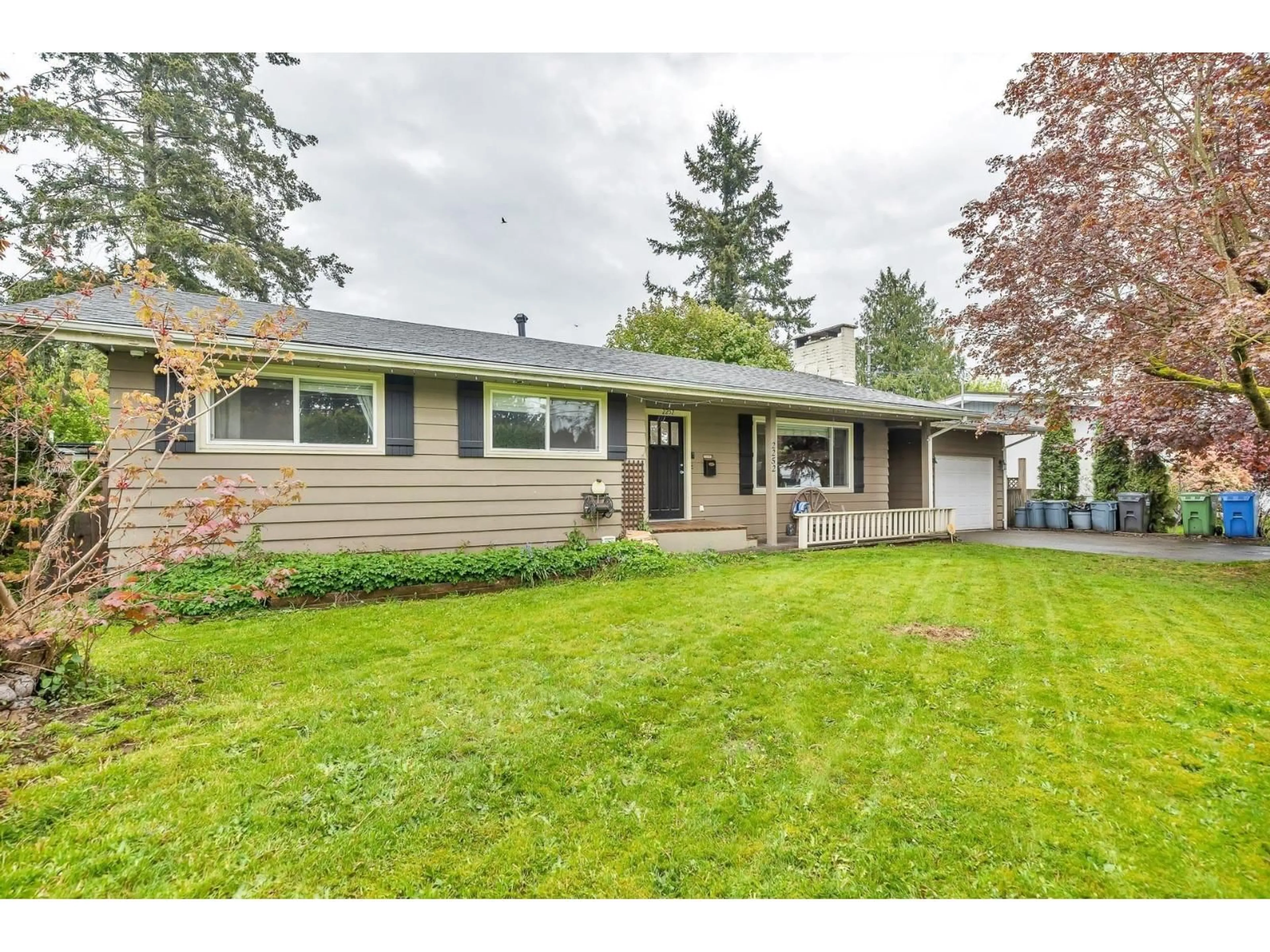 Home with vinyl exterior material, street for 2252 BAKERVIEW, Abbotsford British Columbia V2T3B4