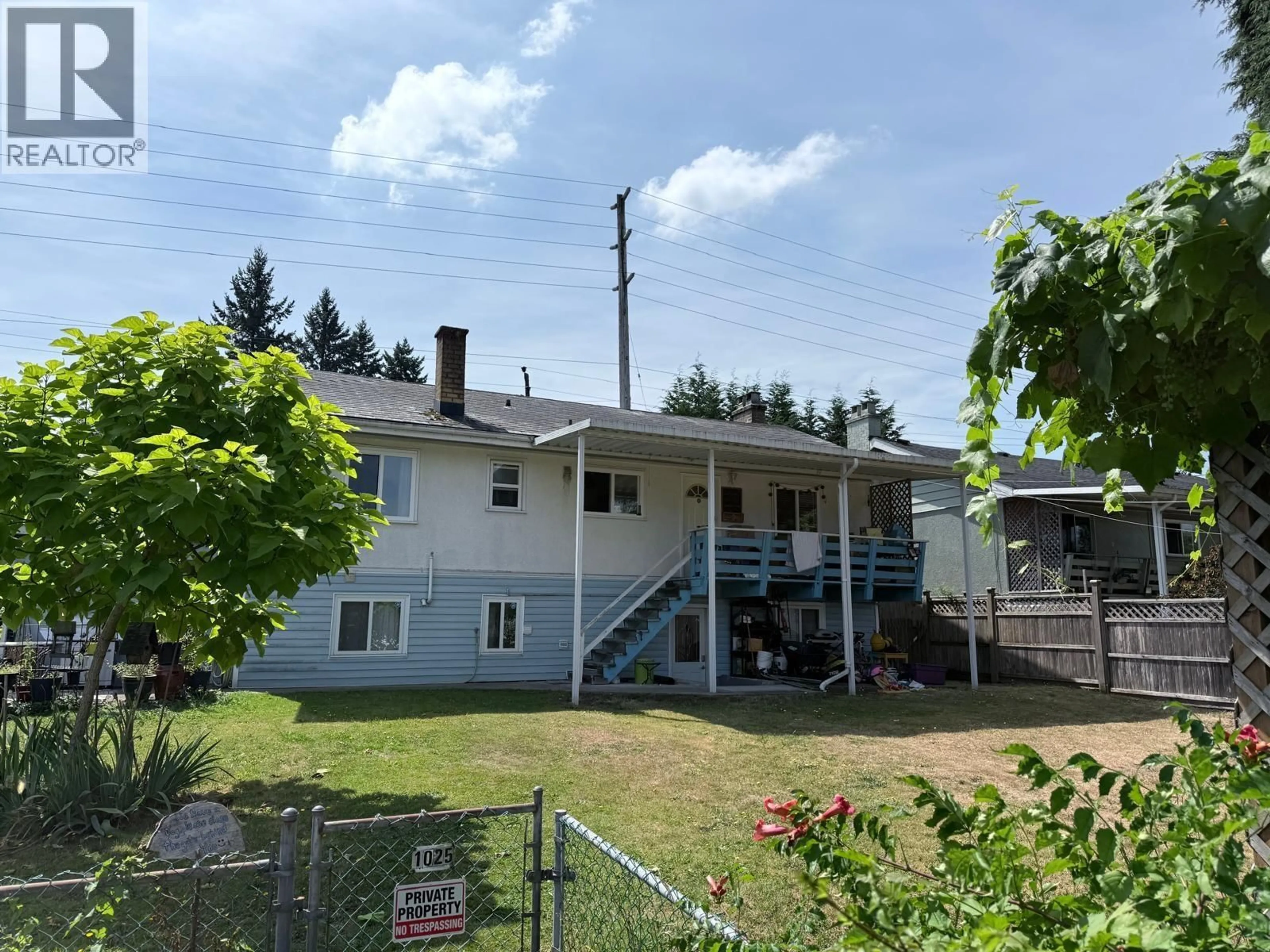 A pic from outside/outdoor area/front of a property/back of a property/a pic from drone, building for 1025 COMO LAKE AVENUE, Coquitlam British Columbia V3J3N7