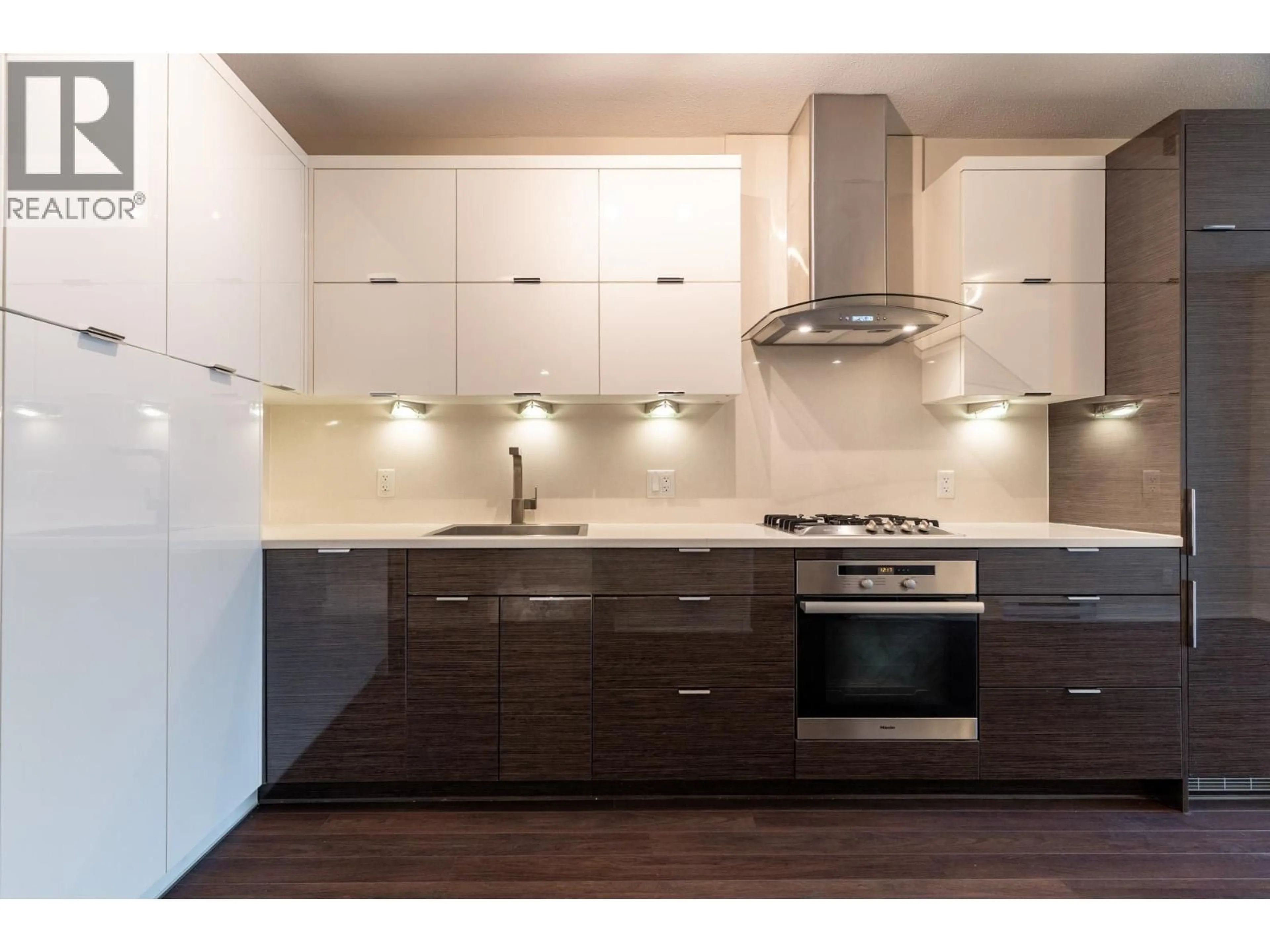 Contemporary kitchen, wood/laminate floor for 202 - 1777 7TH AVENUE, Vancouver British Columbia V6J0E5