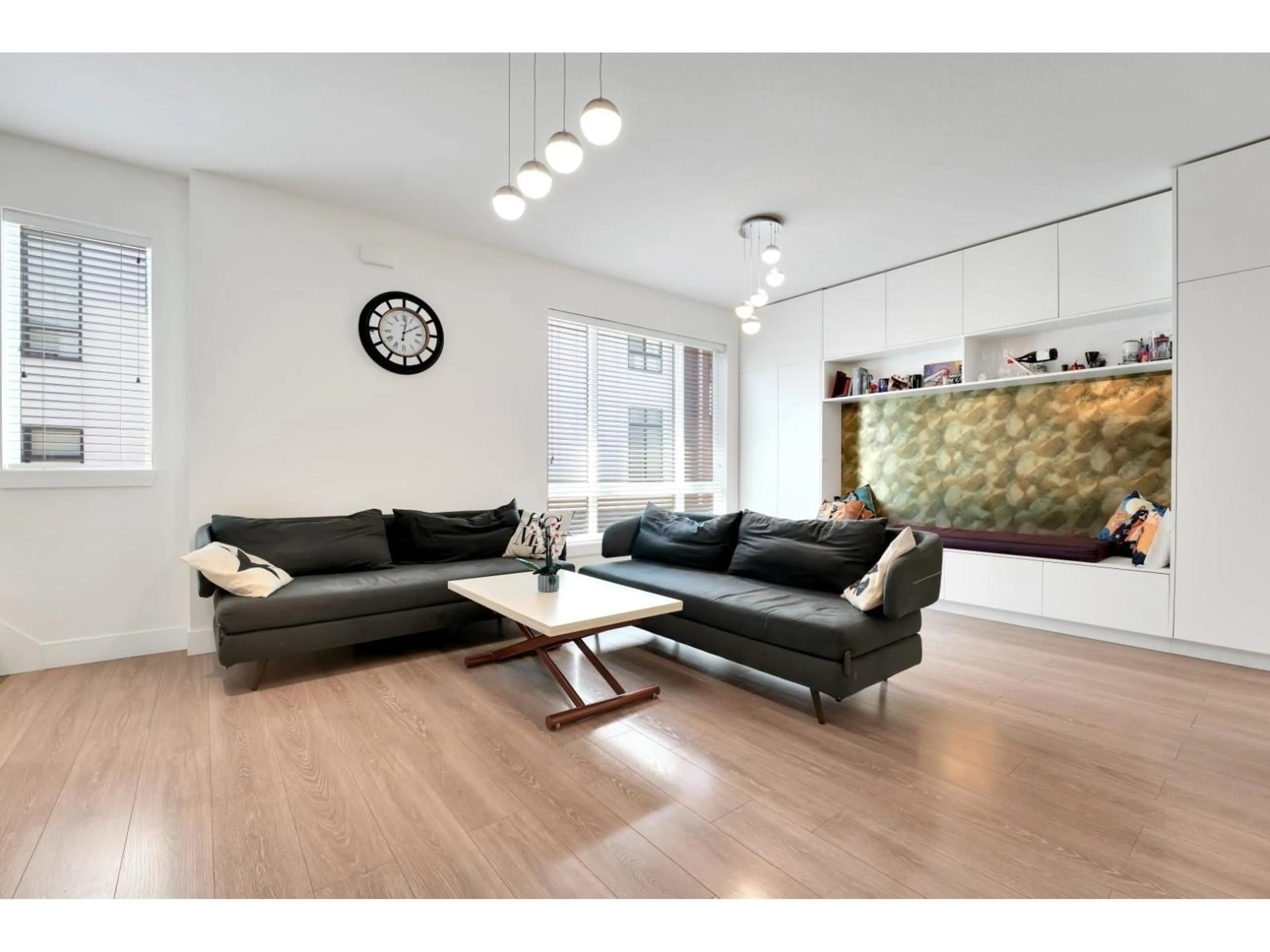Living room with furniture, wood/laminate floor for 168 - 16433 19, Surrey British Columbia V3Z0Z1