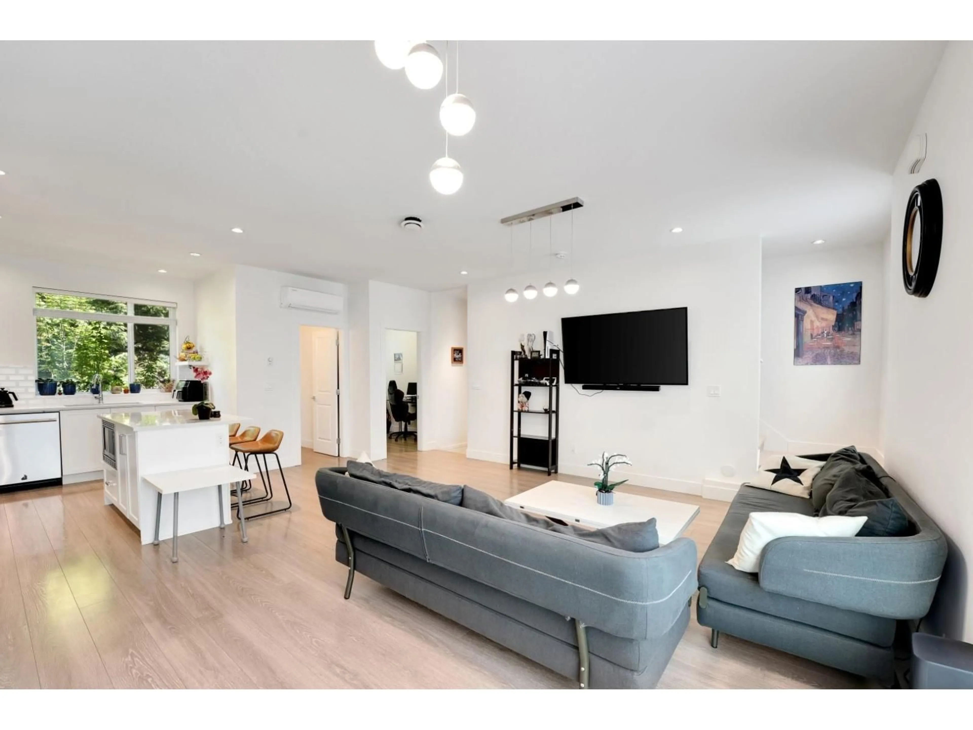 Living room with furniture, wood/laminate floor for 168 - 16433 19, Surrey British Columbia V3Z0Z1