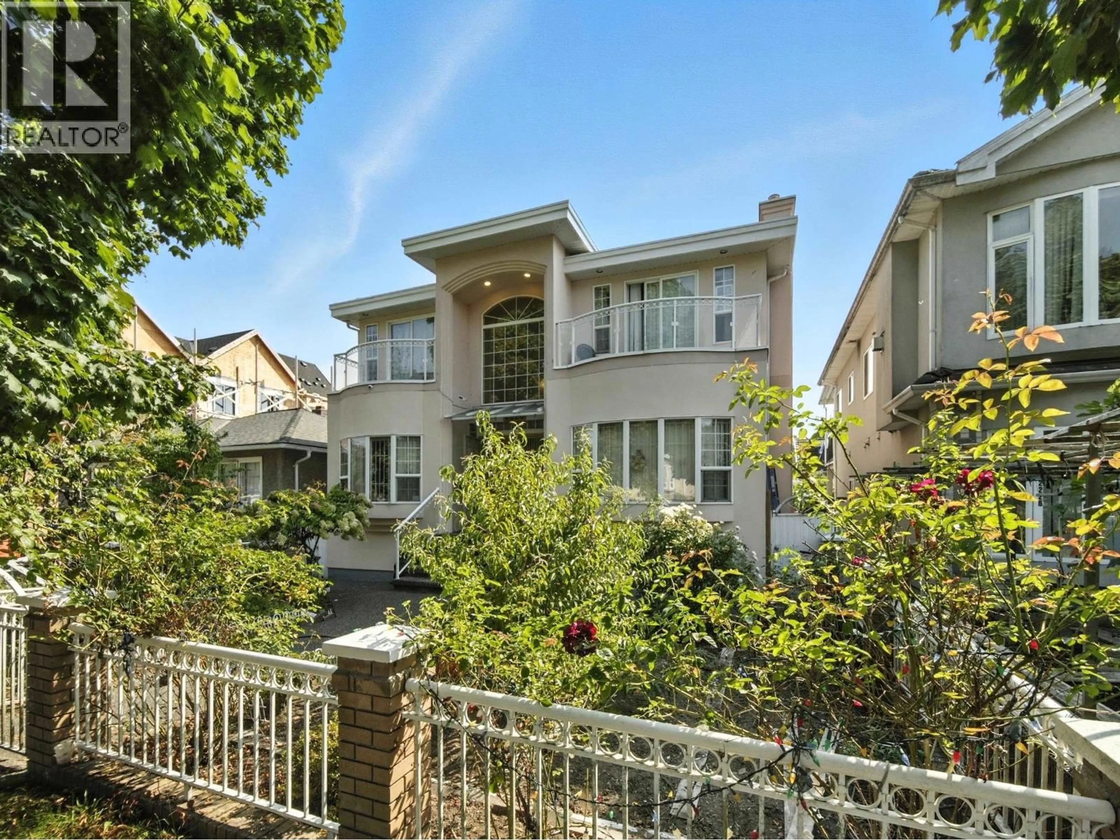 A pic from outside/outdoor area/front of a property/back of a property/a pic from drone, street for 2228 40TH AVENUE, Vancouver British Columbia V5P1J5