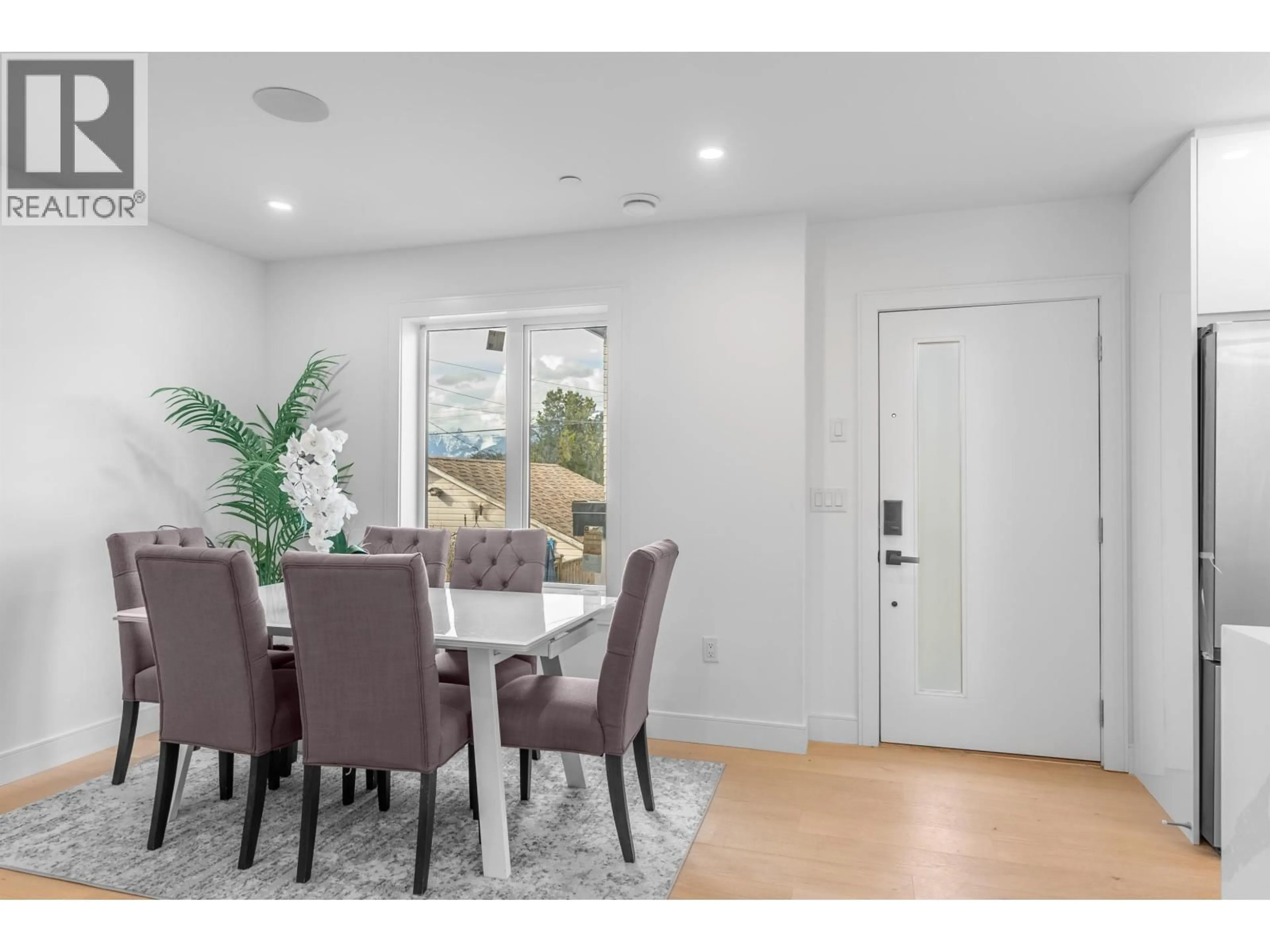 Dining room, wood/laminate floor for 3511 TRIUMPH STREET, Vancouver British Columbia V5K1V2