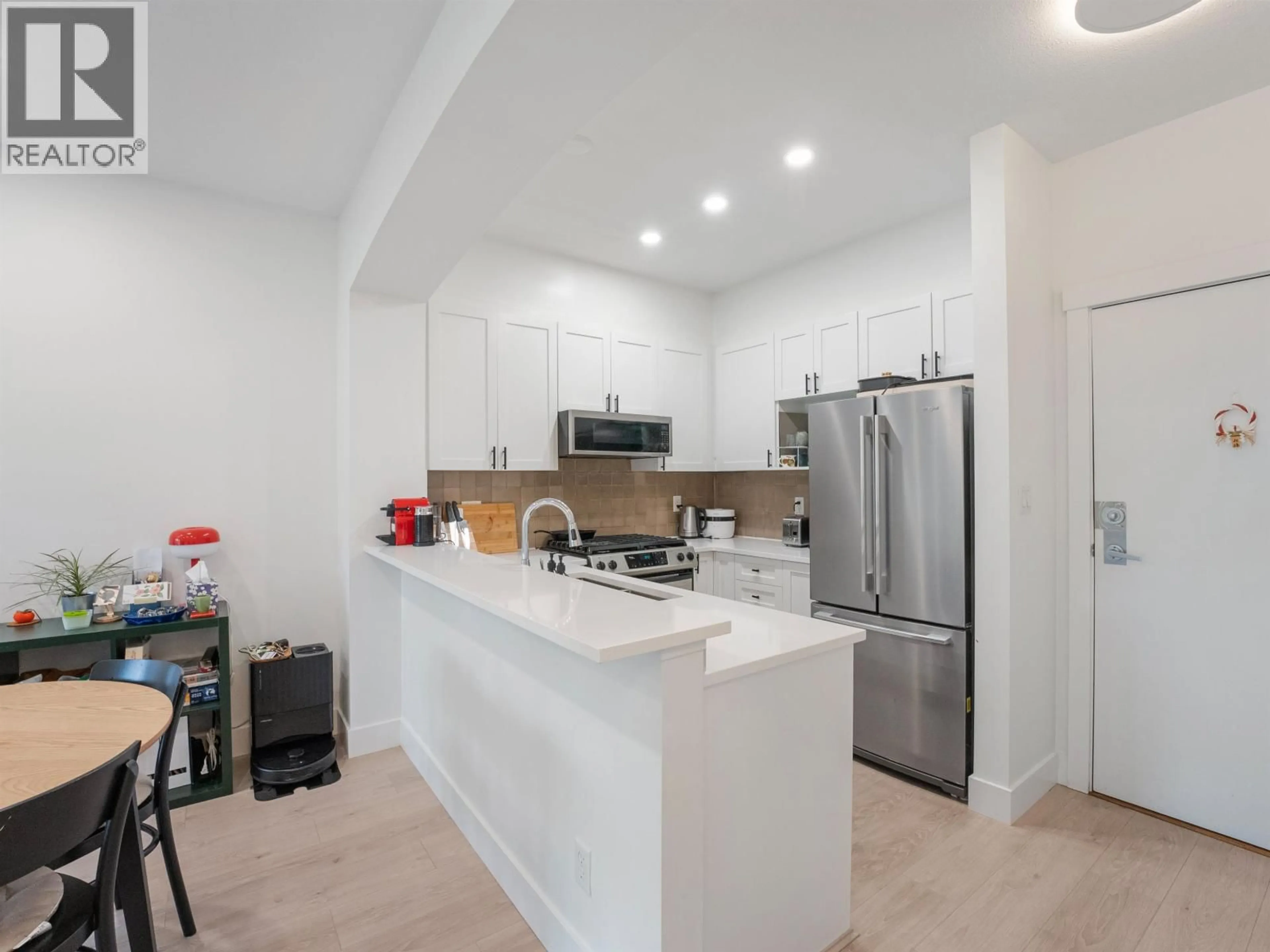 Open concept kitchen, unknown for 320 - 2280 WESBROOK MALL, Vancouver British Columbia V6T2K3