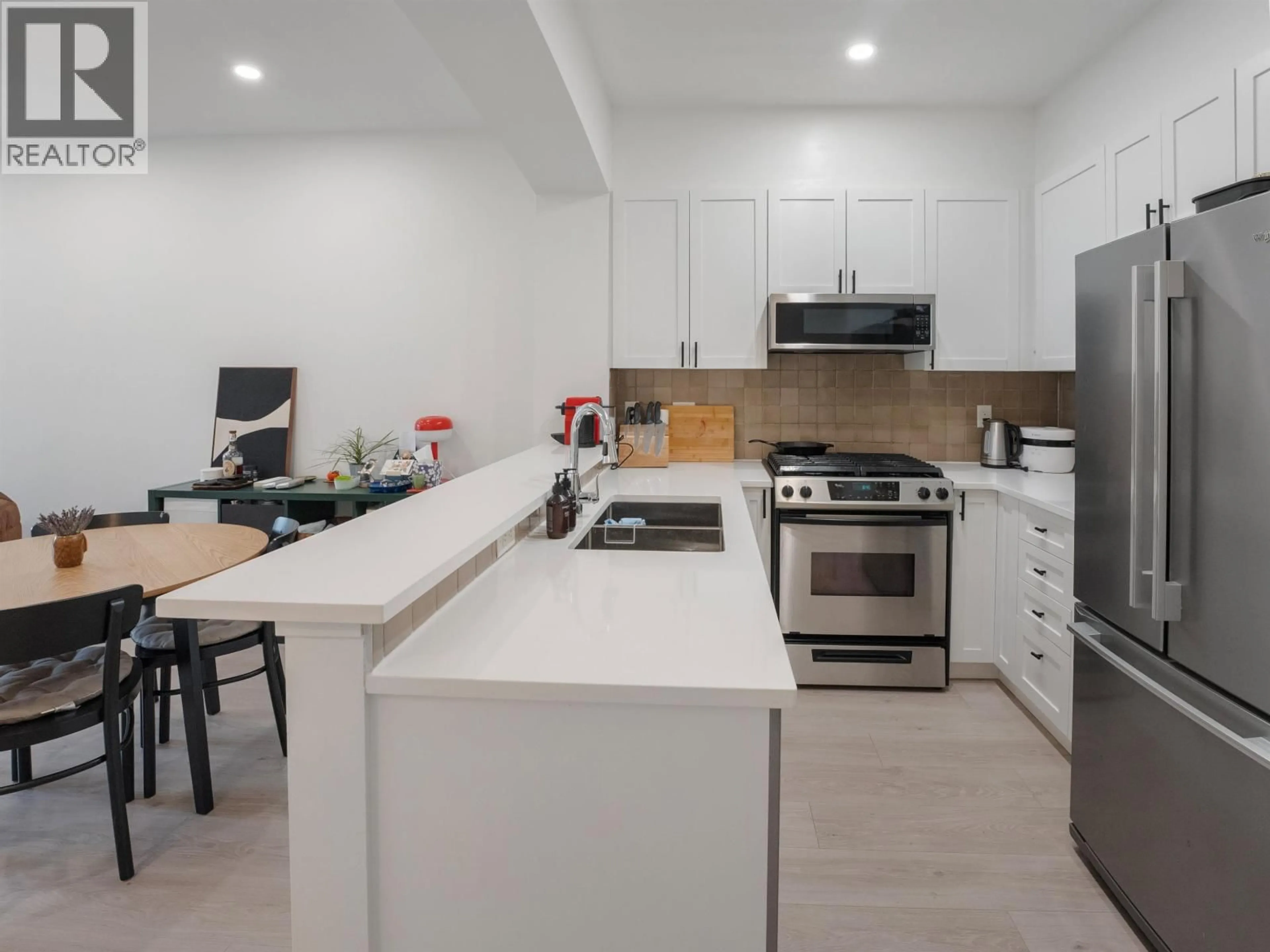 Open concept kitchen, unknown for 320 - 2280 WESBROOK MALL, Vancouver British Columbia V6T2K3