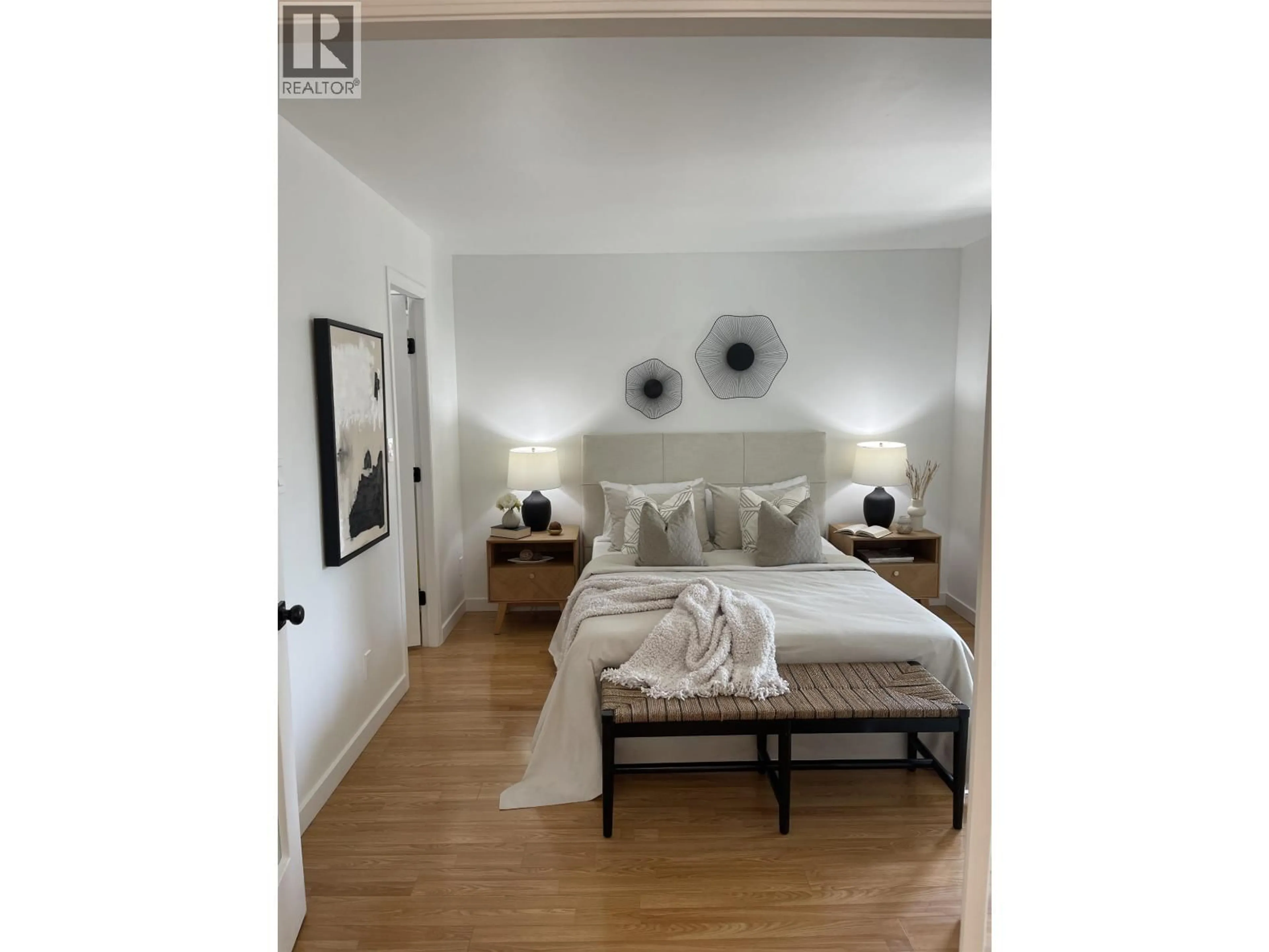Bedroom with bed, wood/laminate floor for 304 - 1220 BARCLAY STREET, Vancouver British Columbia V6E1H3
