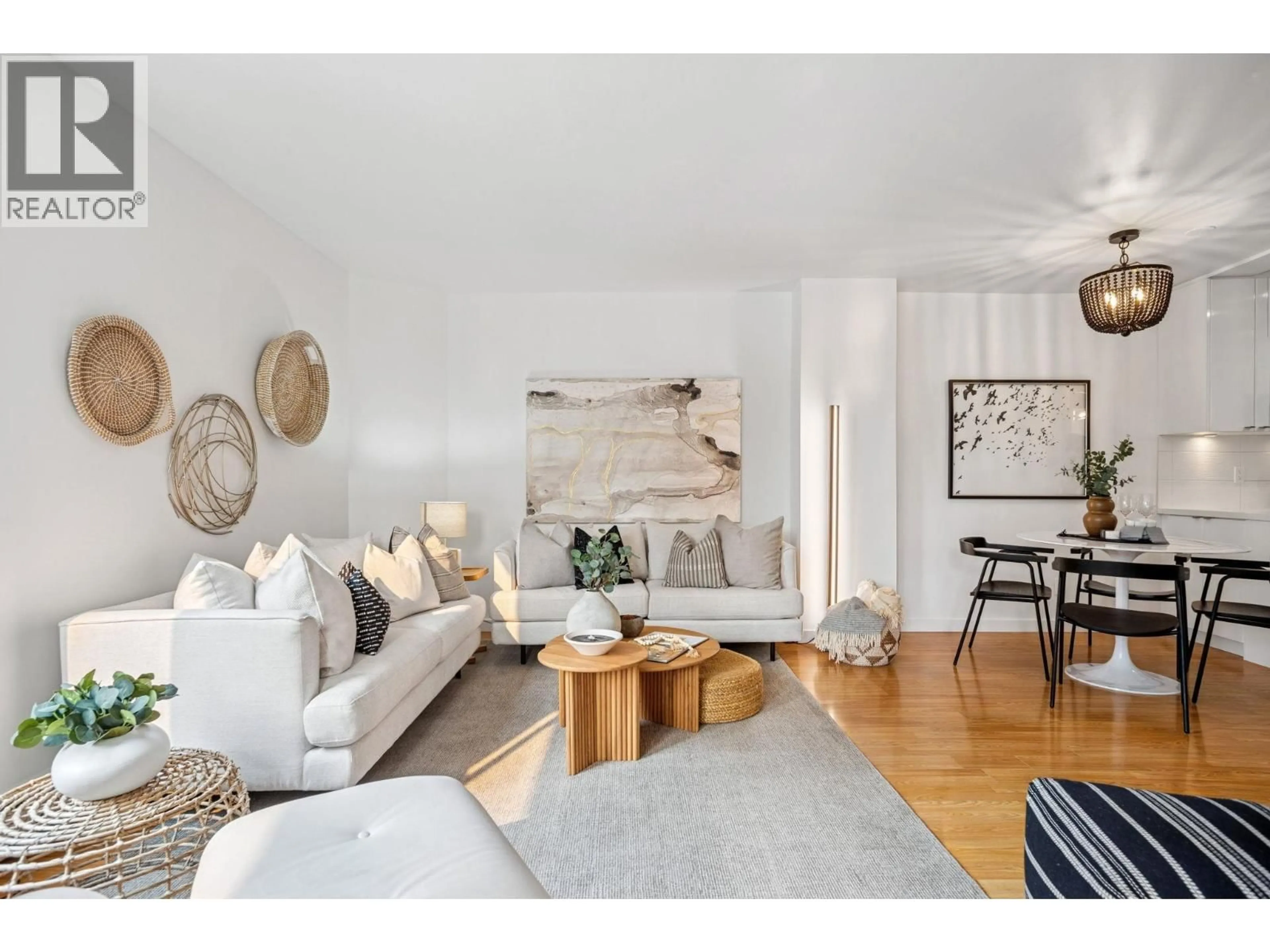 Living room with furniture, wood/laminate floor for 304 - 1220 BARCLAY STREET, Vancouver British Columbia V6E1H3